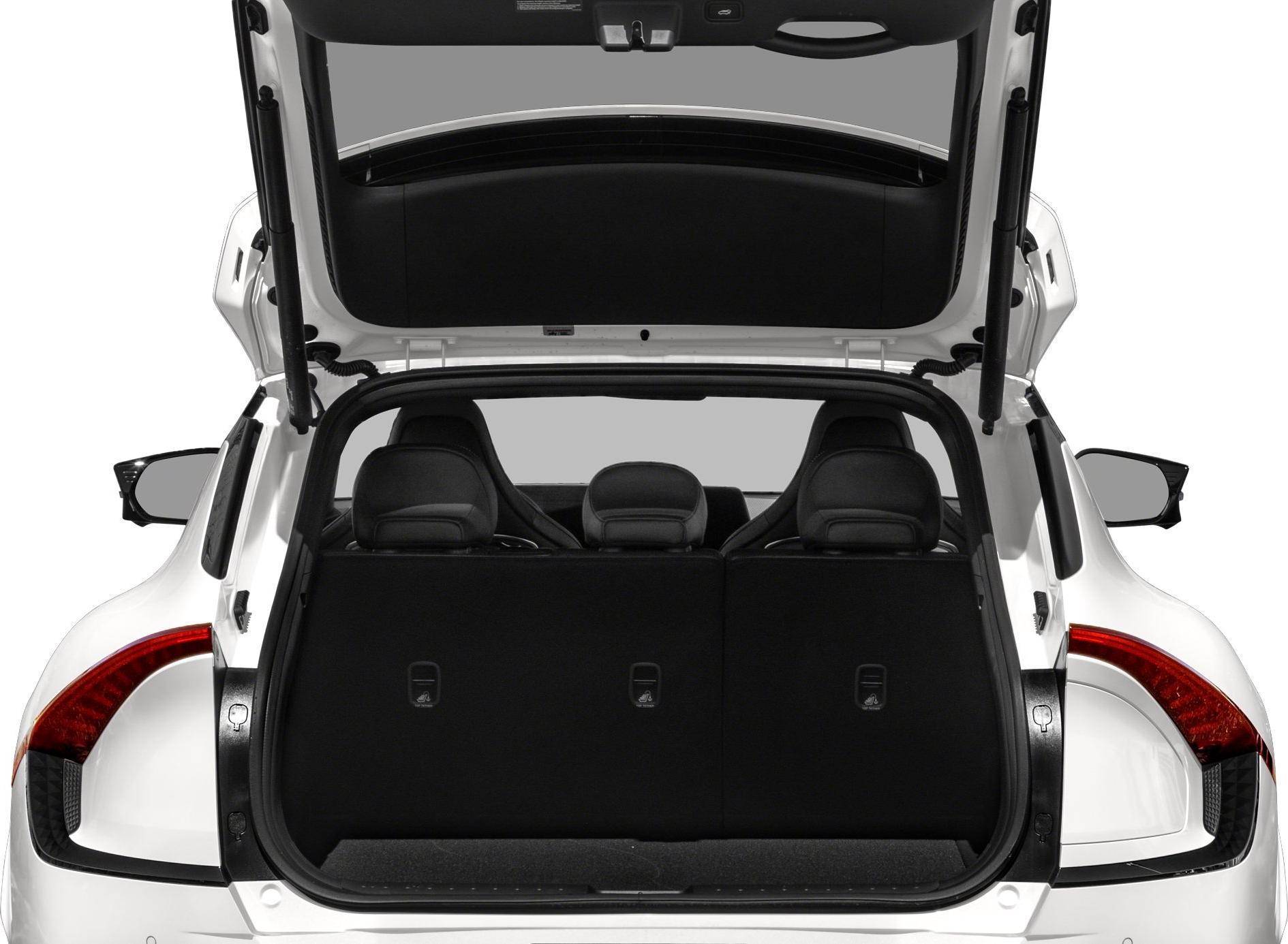 Open rear hatch with visible spacious cargo area and headrests