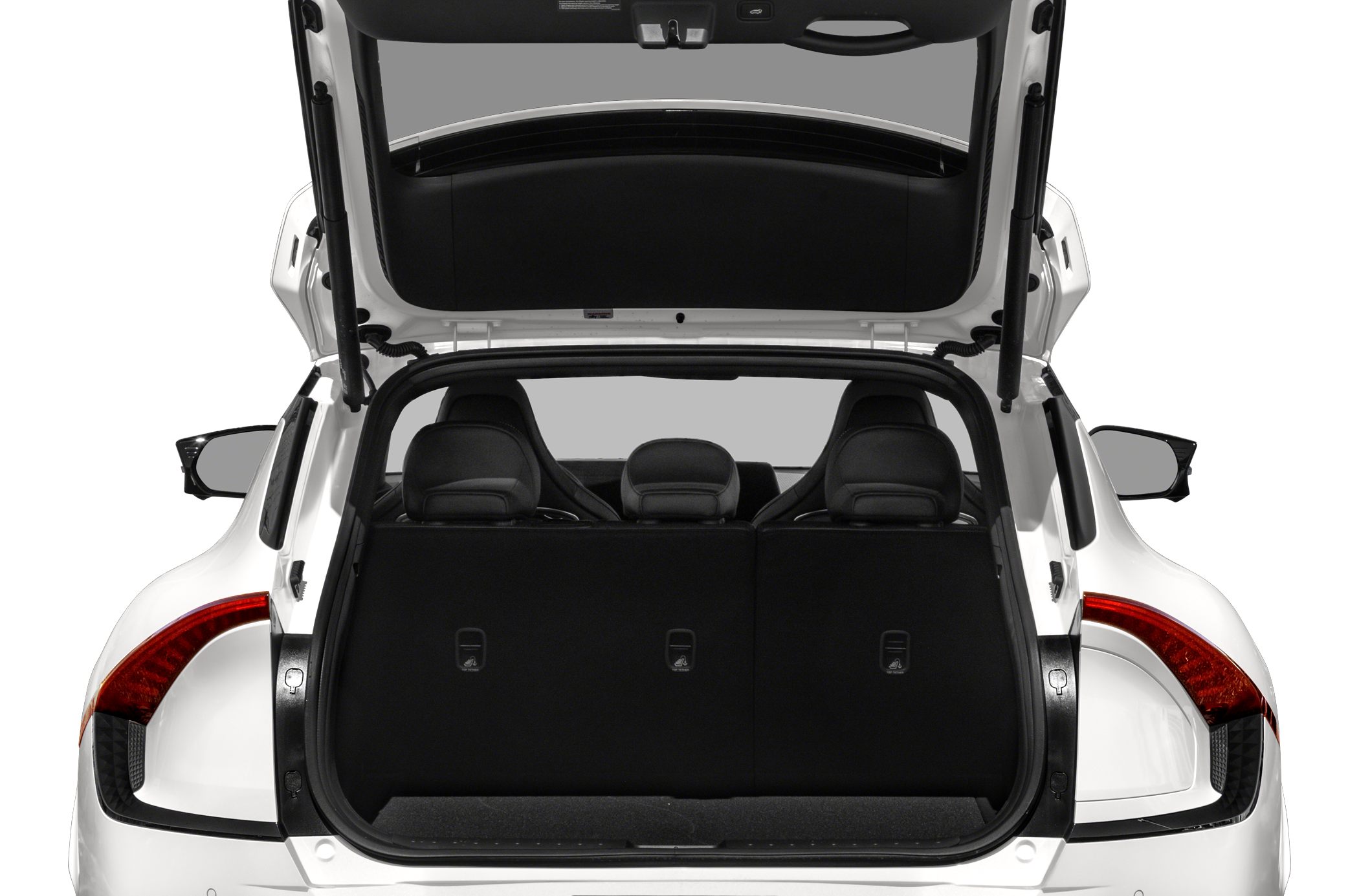 Open rear trunk with visible seating arrangement and taillights
