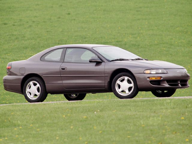Side view of a mid-1990s two-door coupe with aerodynamic design