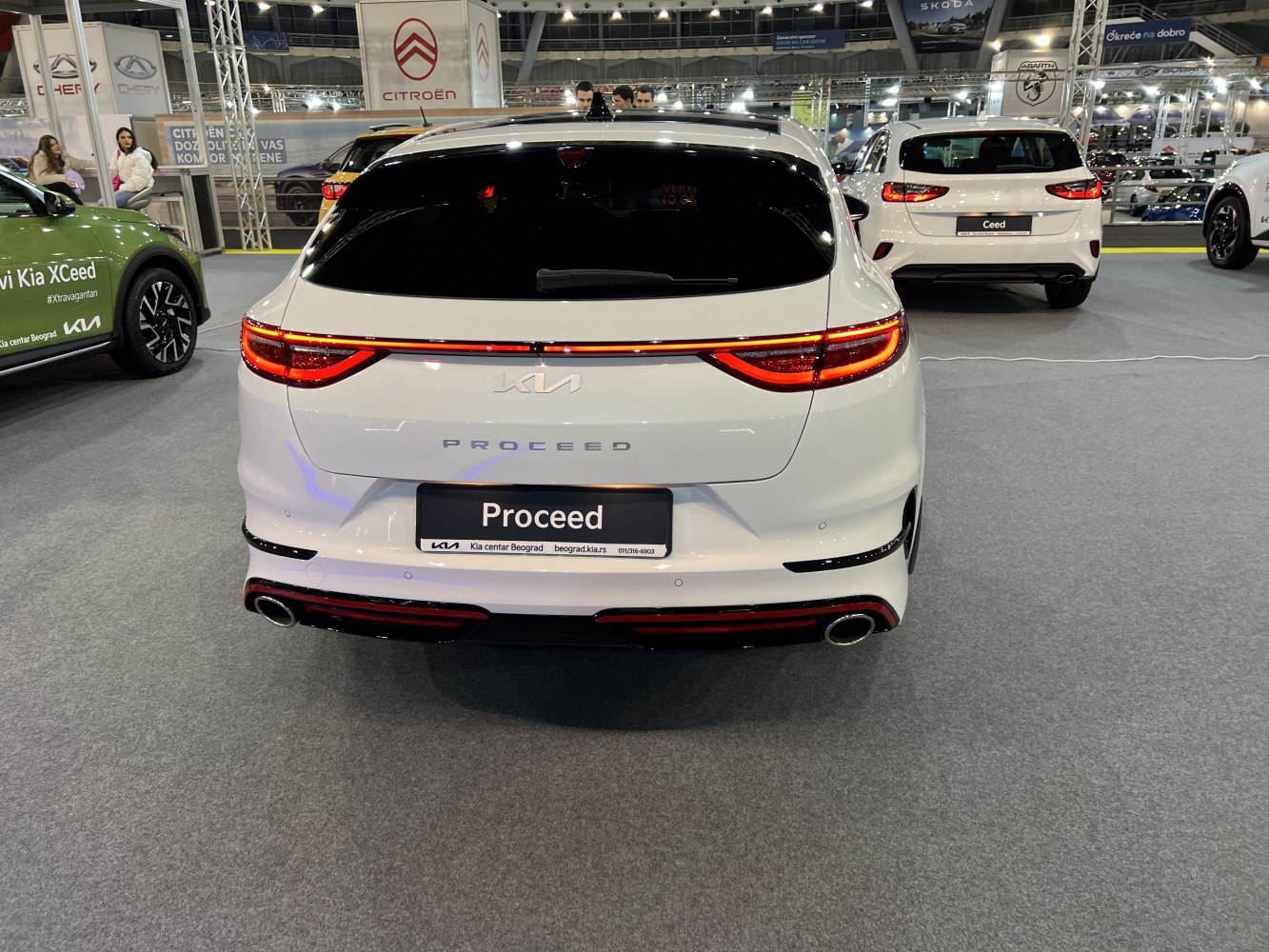Rear view with LED taillight strip and dual exhaust pipes