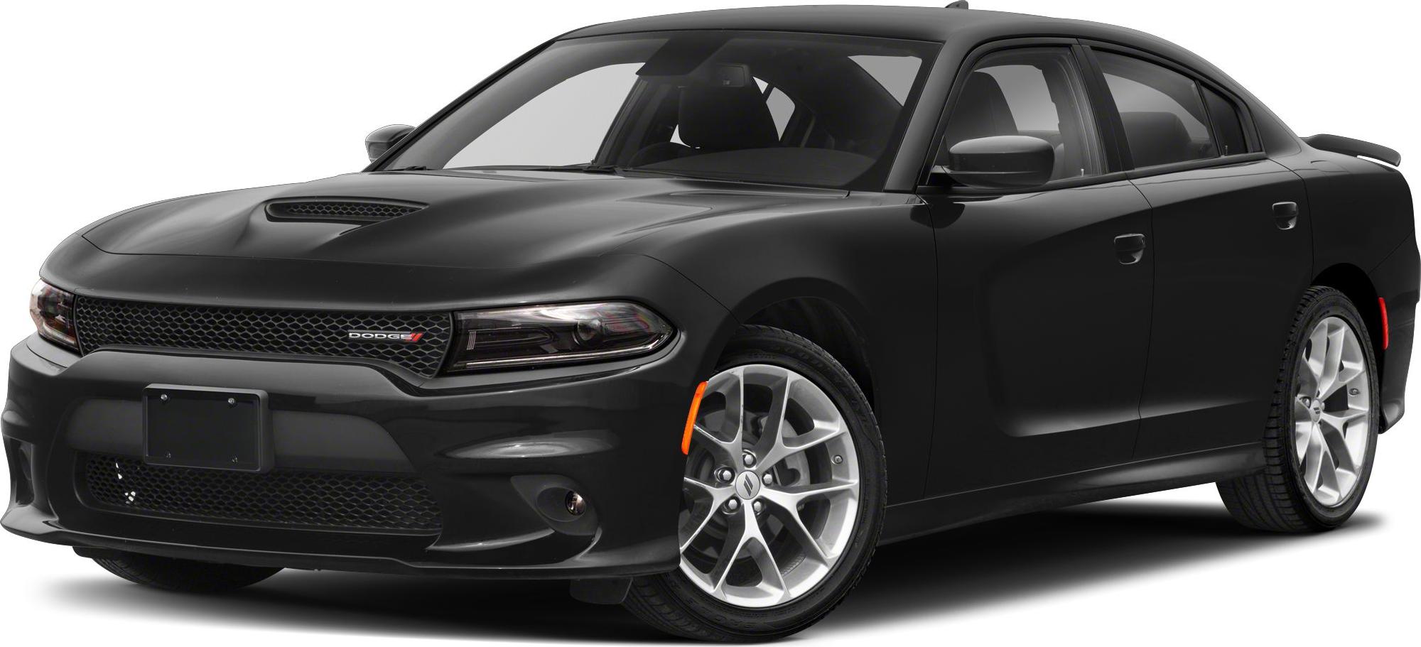 Front three-quarter view of a muscle sedan with aggressive grille and hood scoop