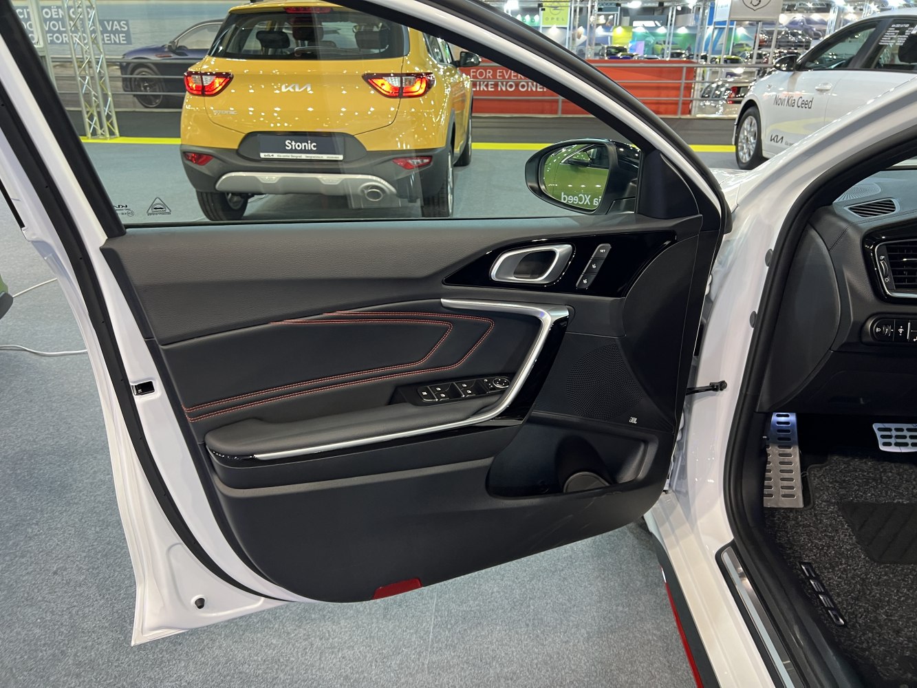 Interior door panel with control buttons and premium trim