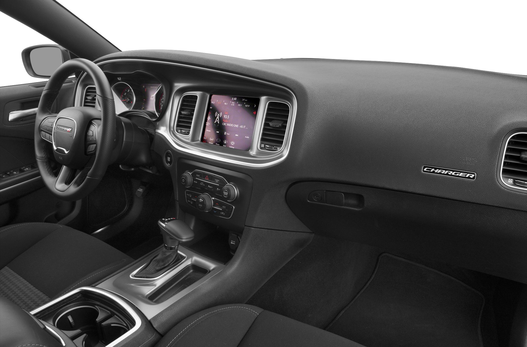 Modern vehicle interior dashboard and center console with infotainment screen and gear shifter