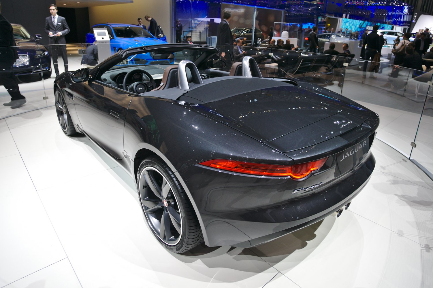 Convertible rear view with illuminated taillights and alloy wheels