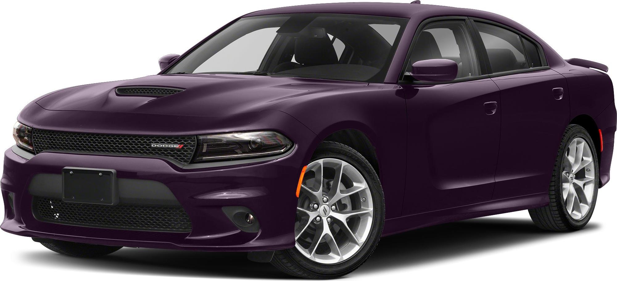 Front three-quarter view of muscle sedan with hood scoop and alloy wheels