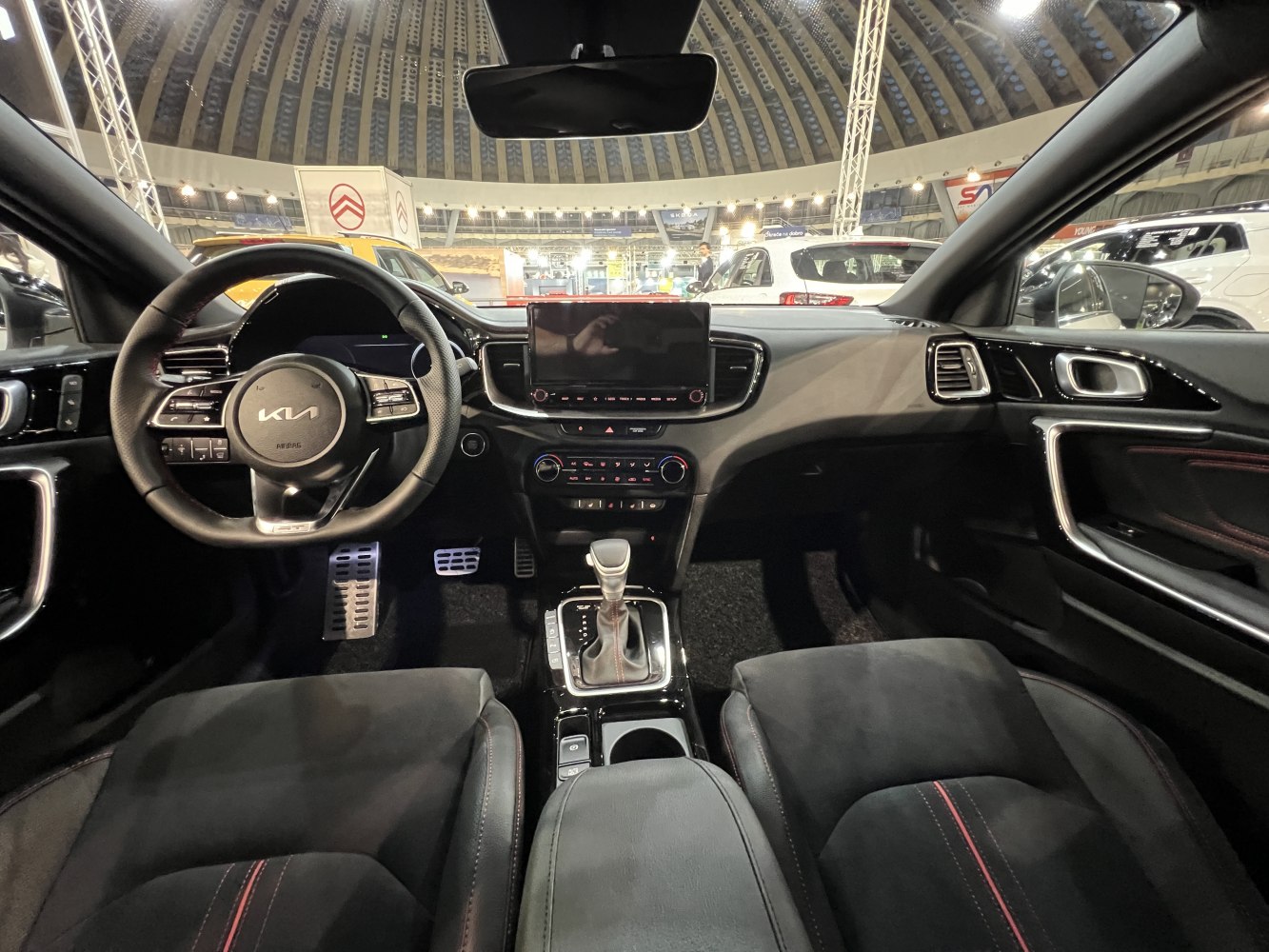 Interior dashboard with infotainment and multifunction steering wheel