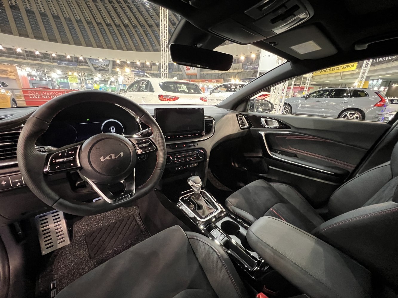 Digital dashboard, multifunction steering wheel, touchscreen, and automatic gear shifter