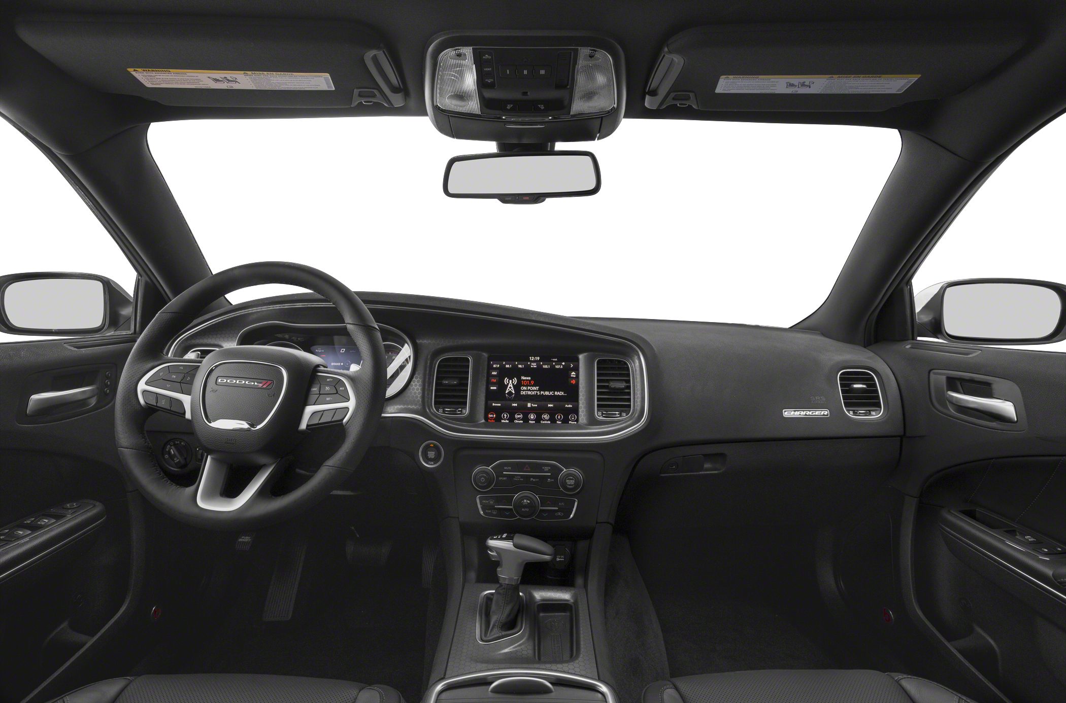 Car interior with dashboard, steering wheel, and infotainment system