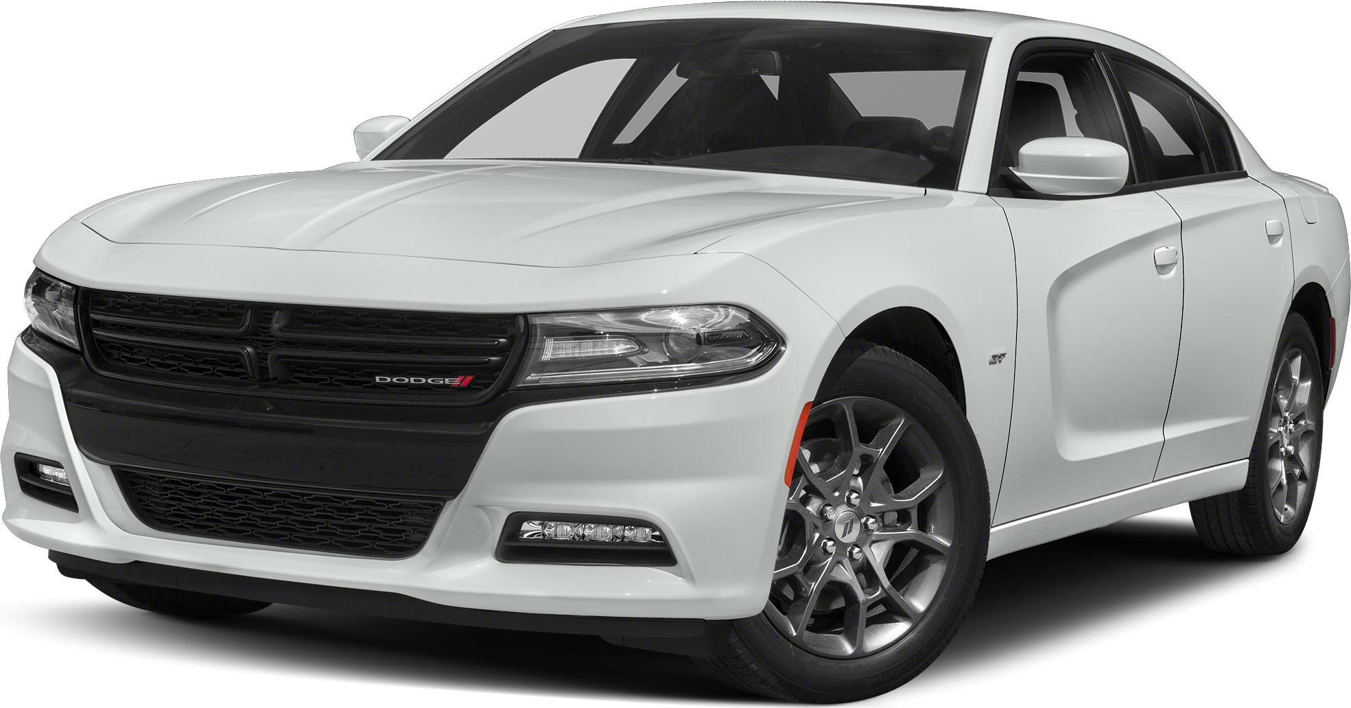 Front grille and headlights of a white sports sedan with alloy wheels