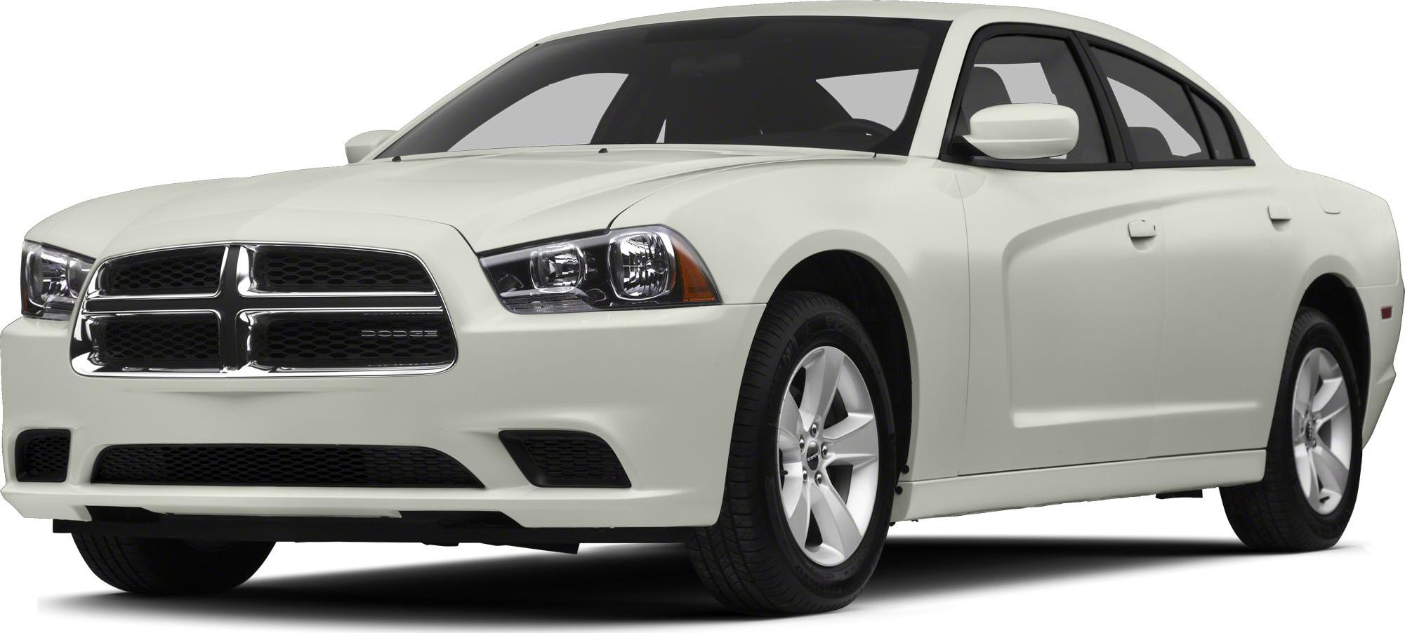 Close-up of front grille, headlights, and side view of white sedan