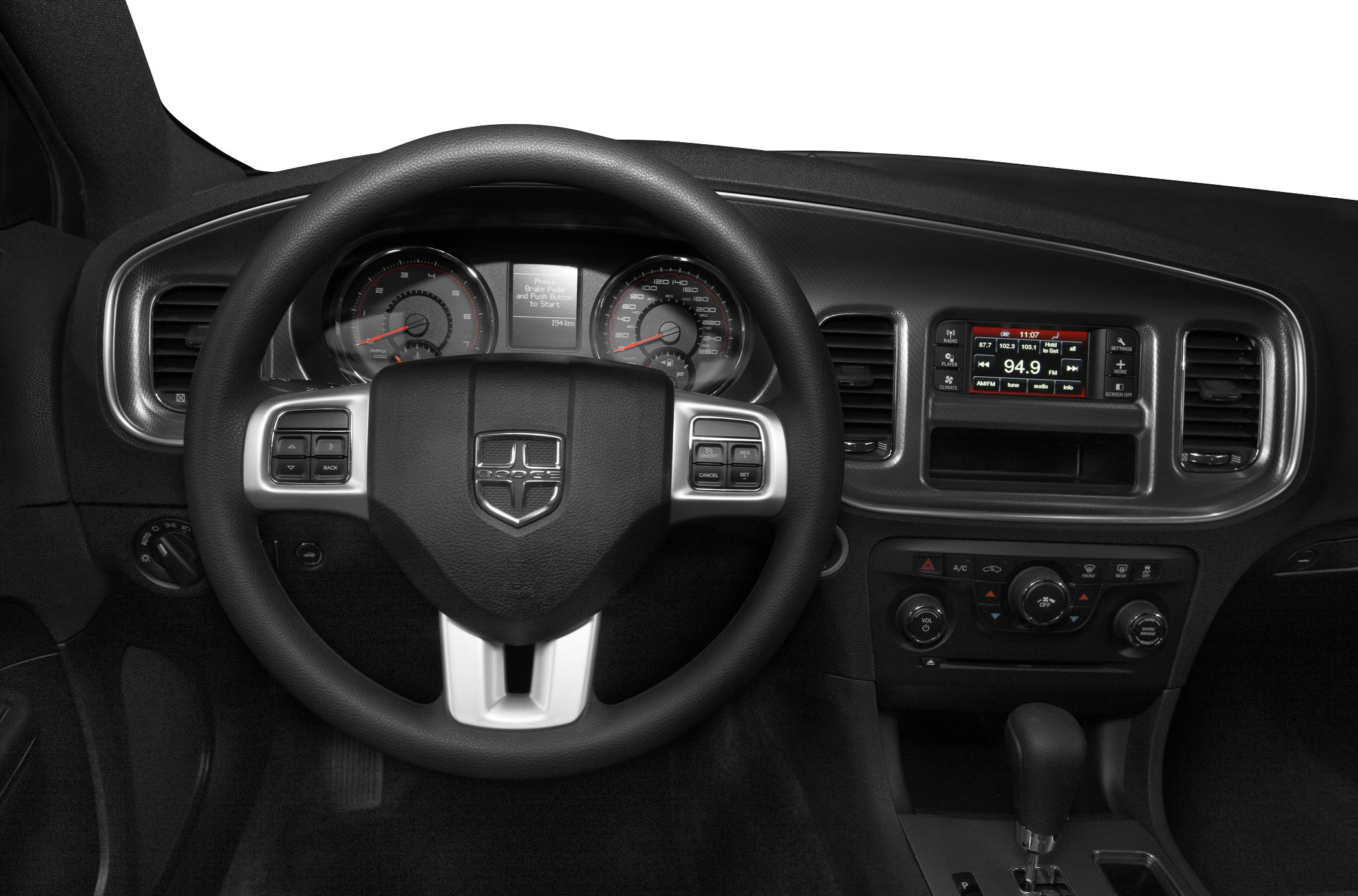 Steering wheel and dashboard with instrument cluster and infotainment system