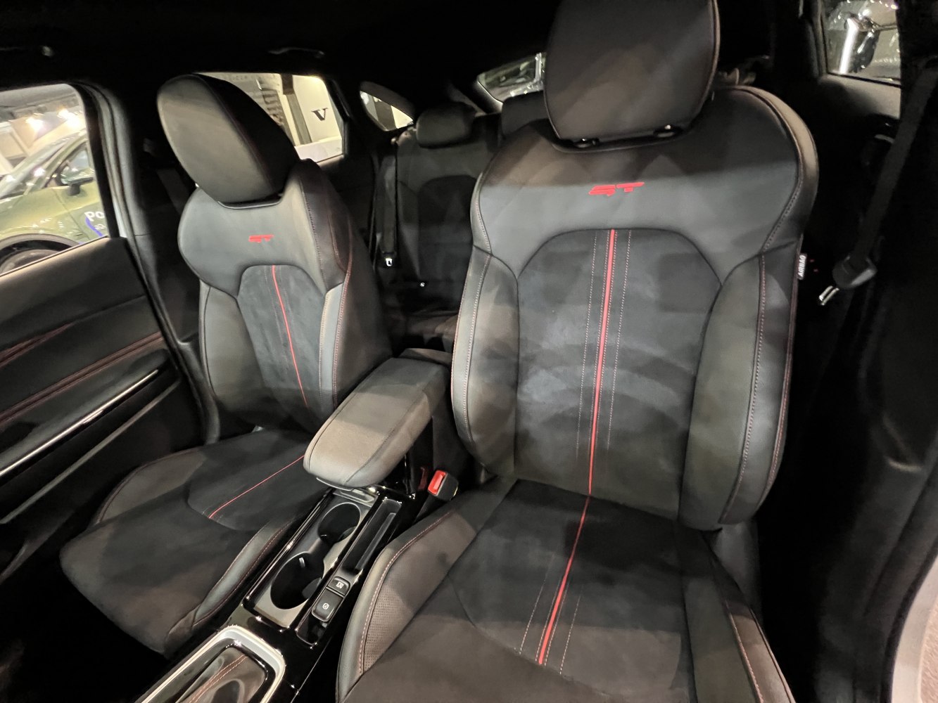 Leather front seats with red ST embroidery and sporty red stitching
