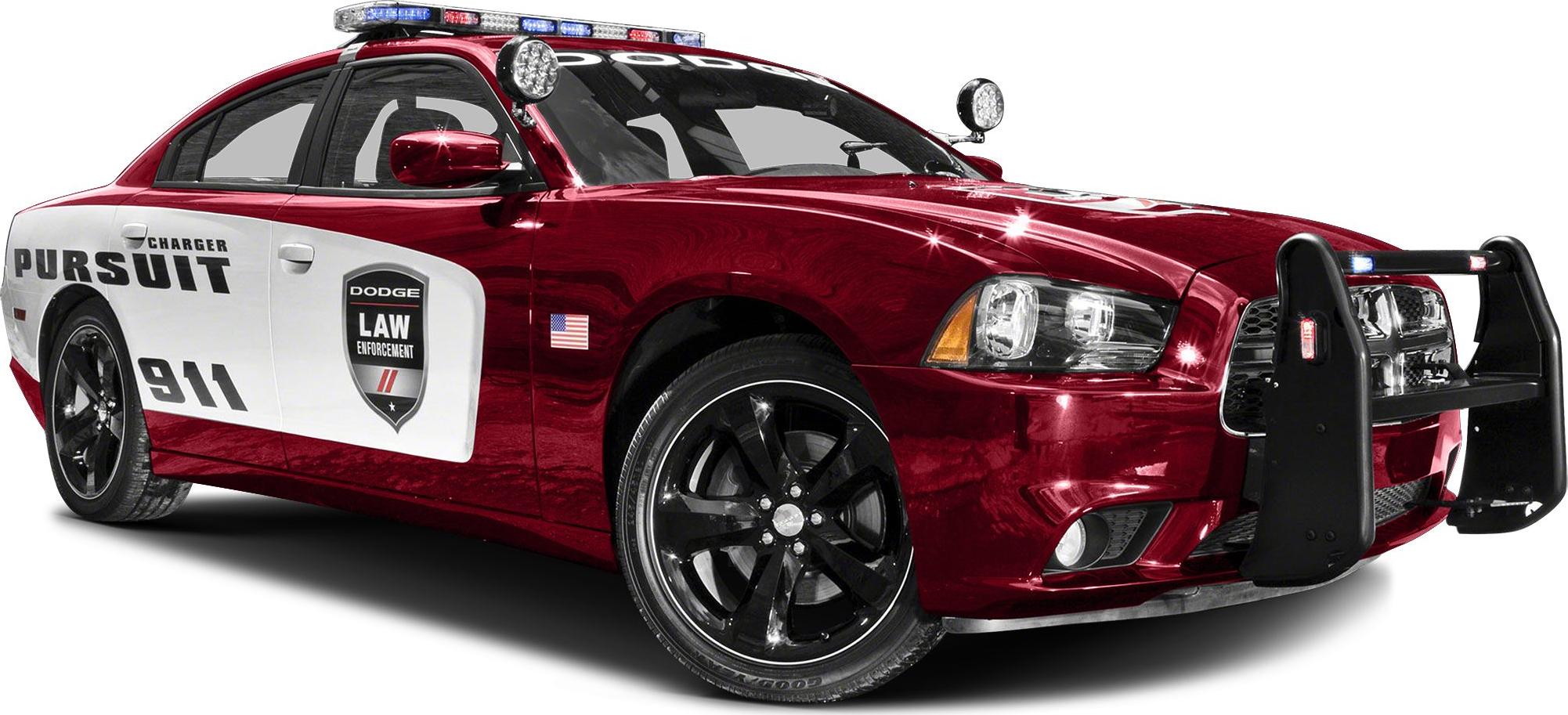 Red and white police pursuit vehicle with emergency lights and push bumper