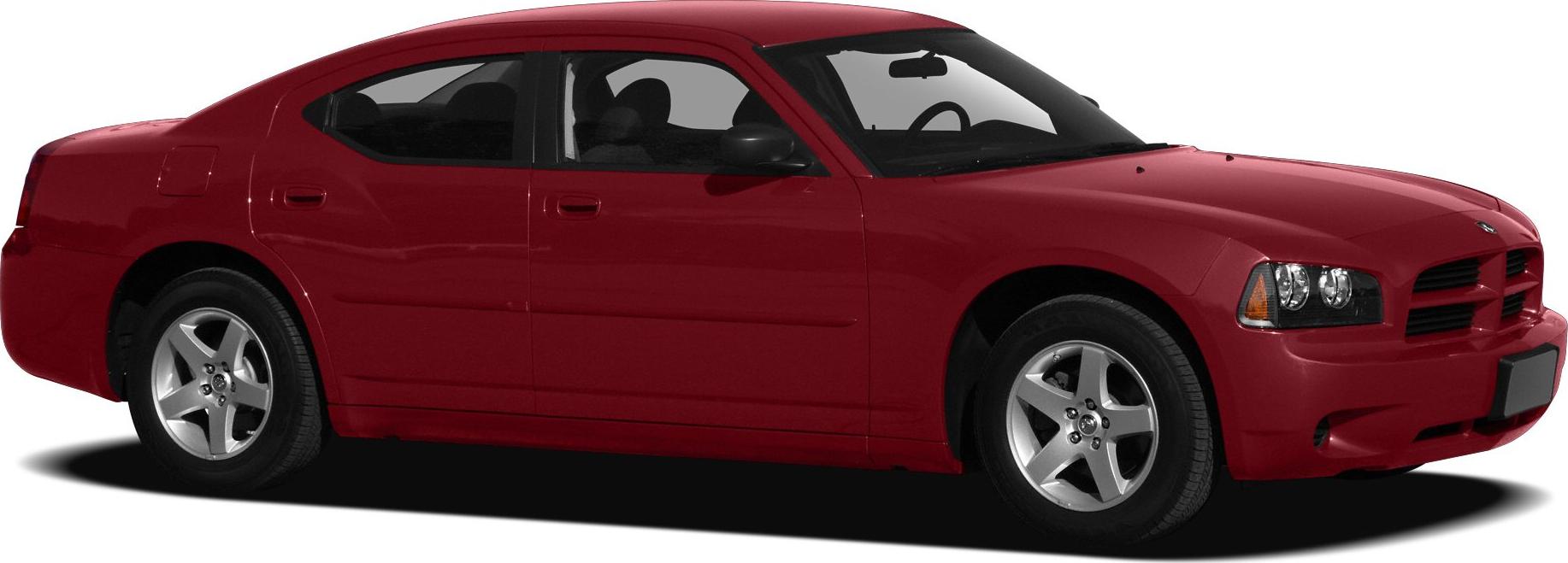 Red sedan with distinctive headlights and alloy wheels side view