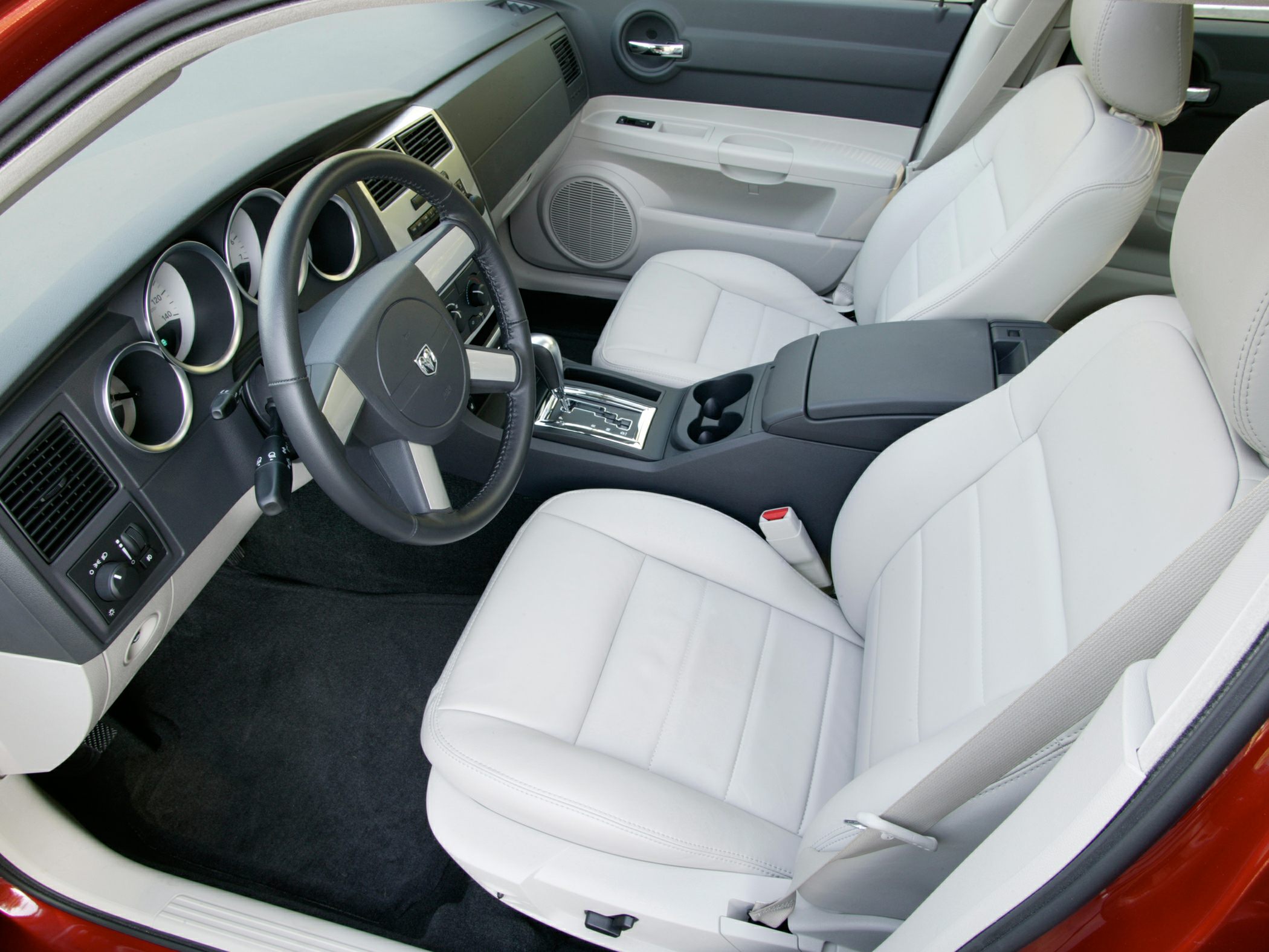 Modern dashboard and plush front seats with automatic gearshift