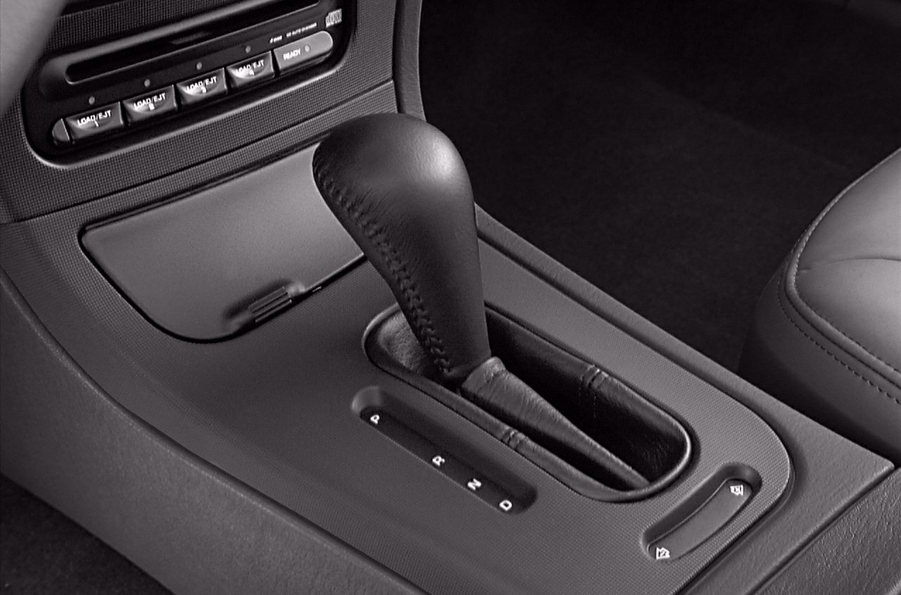 Automatic gear shift lever and center console controls
