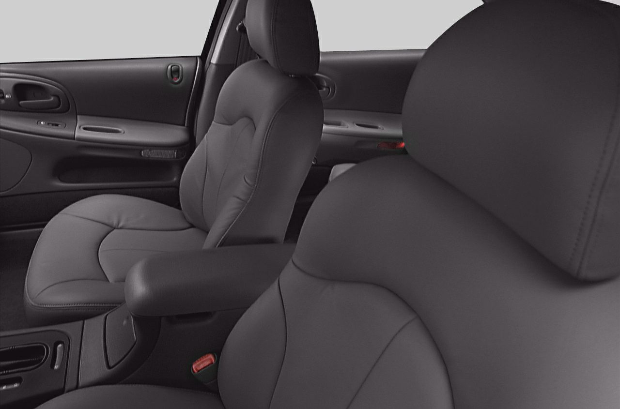 Black leather front seats with door panel in car interior