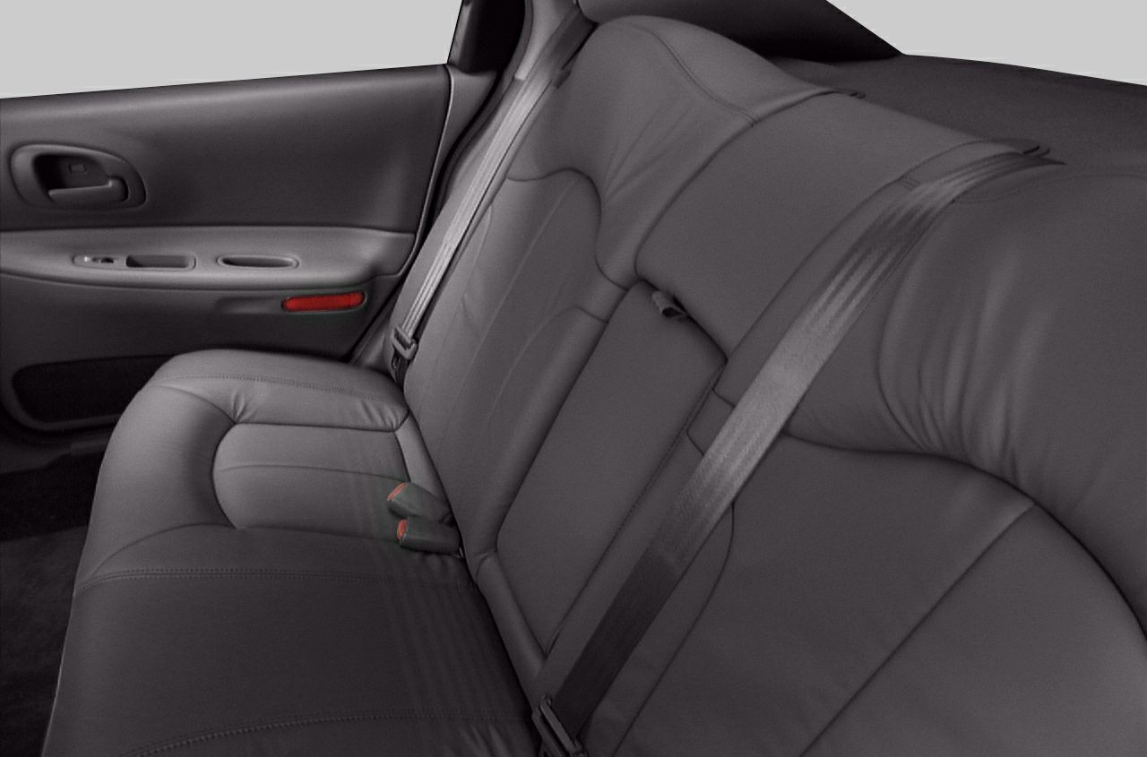 Rear seat interior with leather upholstery and seat belts