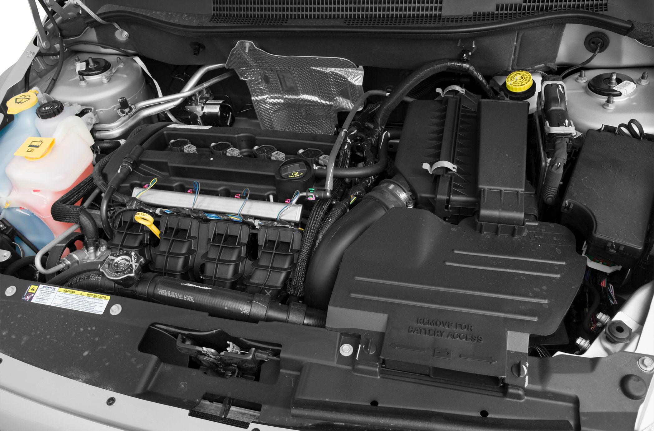 Engine bay with intake system and fluid reservoirs