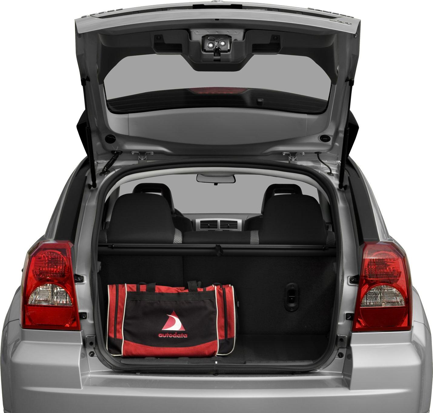 Open hatchback trunk view with visible rear seats and cargo bag