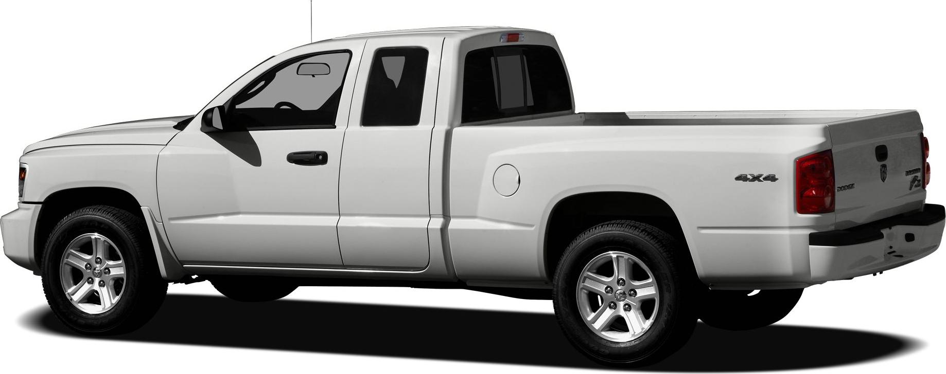 Extended cab pickup truck with long bed and 4x4 rear badge side view