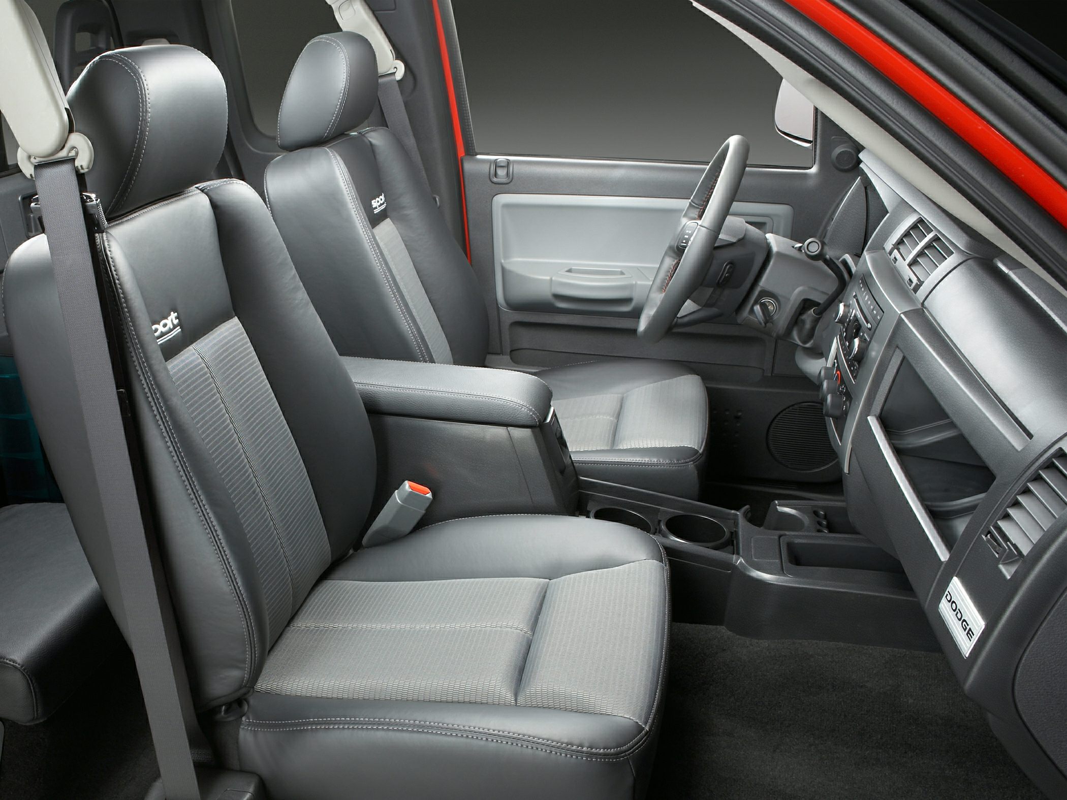 Sporty seats with dual cup holders and practical dashboard layout