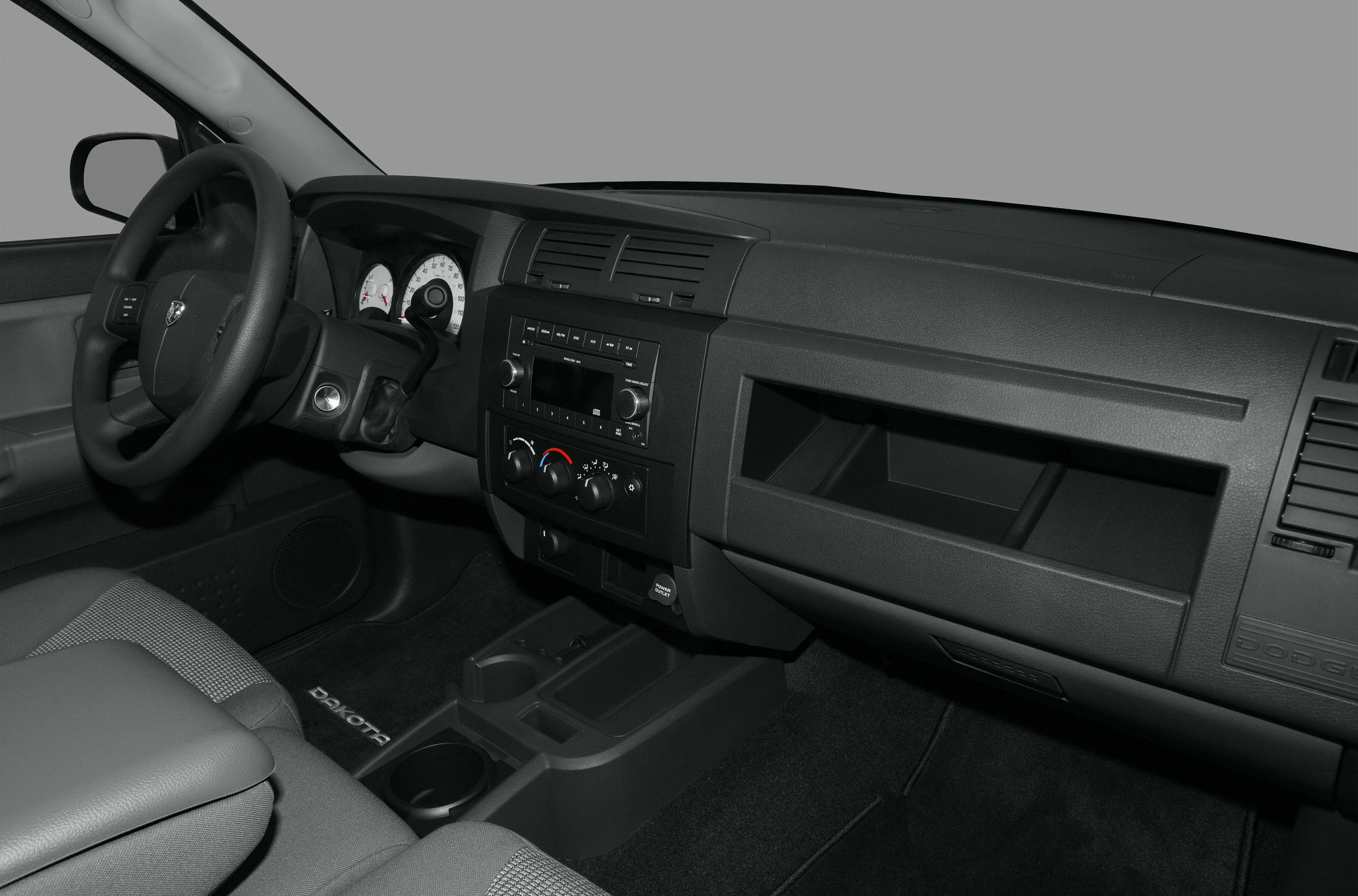 Dashboard and steering wheel with ergonomic controls and instrument cluster