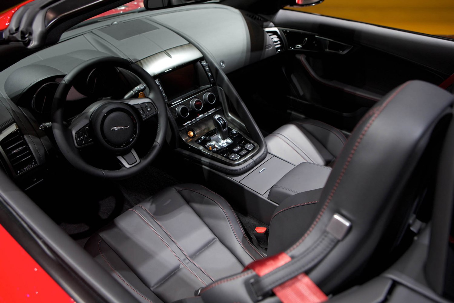 Leather seats and central console with gear shifter and controls