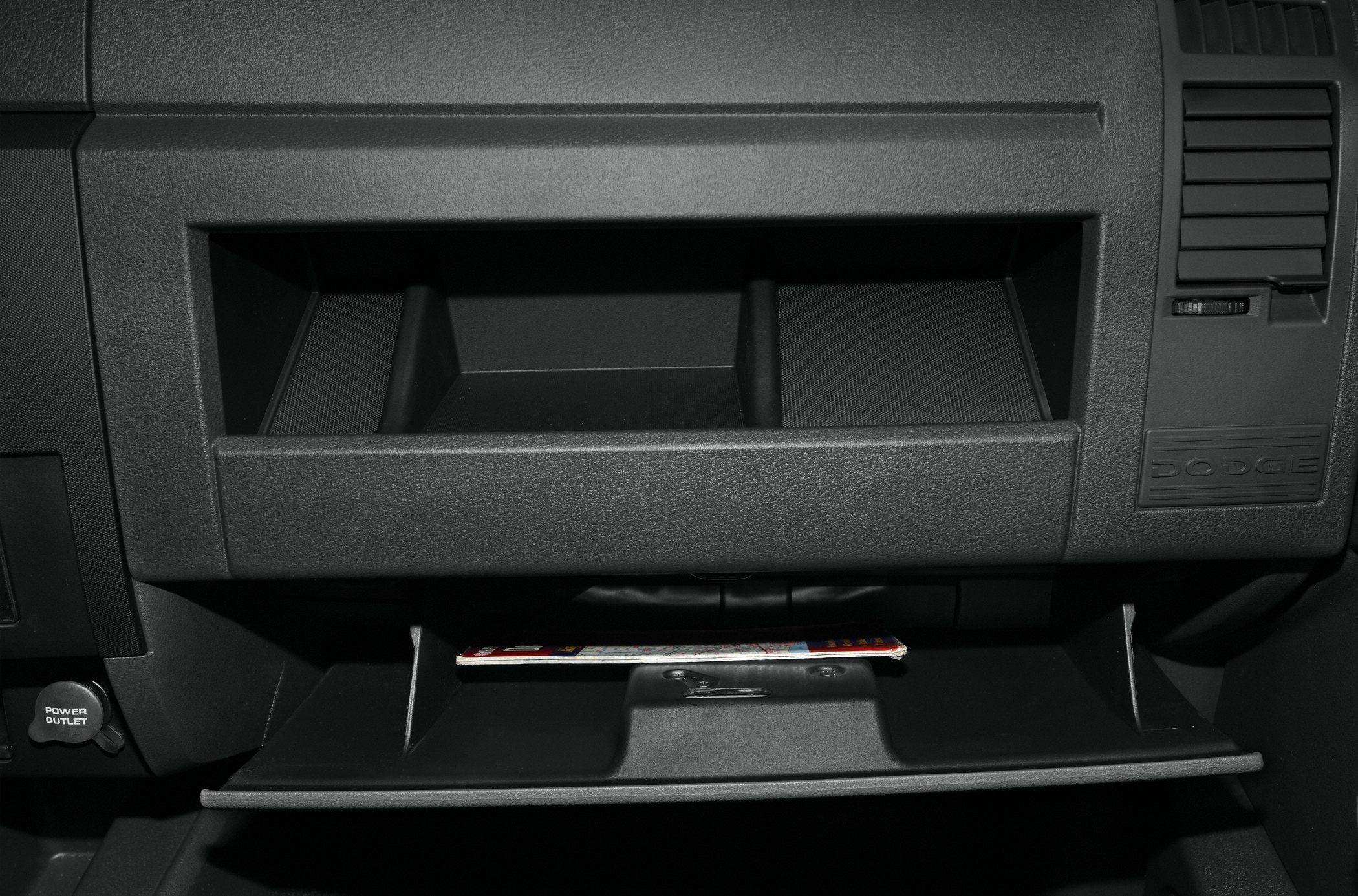 Split compartment and glovebox storage in vehicle dashboard