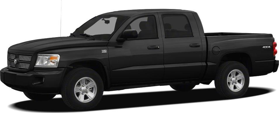 Black double cab pickup truck side view with alloy wheels