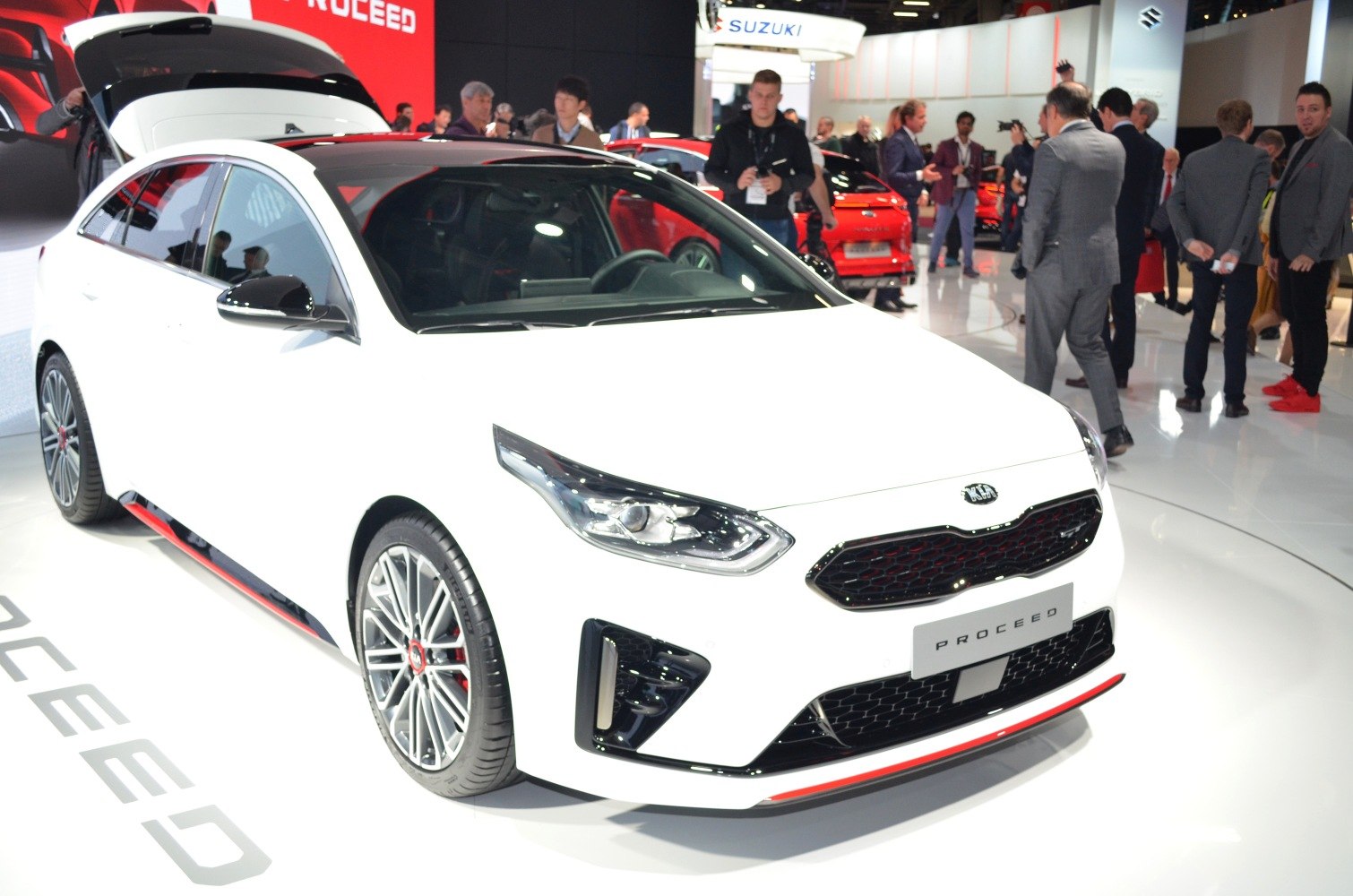 Sporty hatchback front and side view with alloy wheels