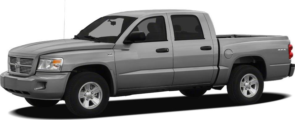 Silver midsize pickup truck with crew cab and 4x4 drivetrain.