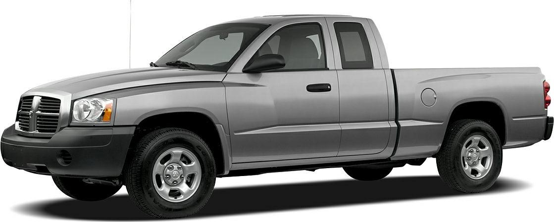 Extended cab pickup truck side profile with alloy wheels and fuel cap