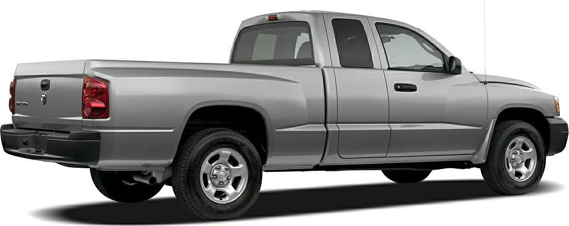 Silver extended cab pickup truck with single rear door and alloy wheels