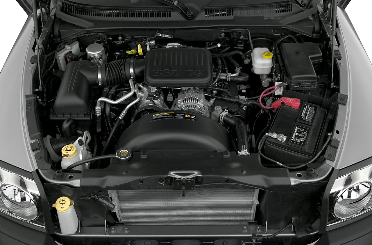 3.7L V6 Magnum engine bay with visible radiator, battery, and fluid caps