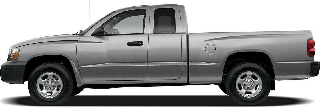 Side profile of extended cab pickup truck with gray body and alloy wheels