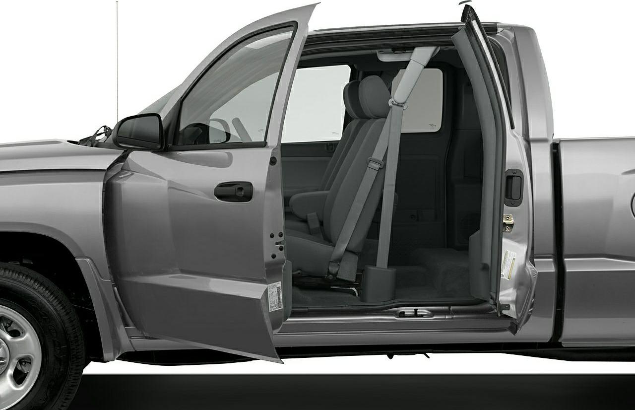 Extended cab with front and rear side doors open.
