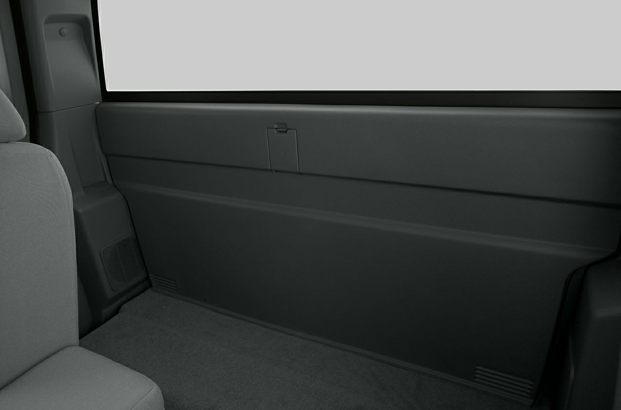 Rear interior side wall panel and seat upholstery.