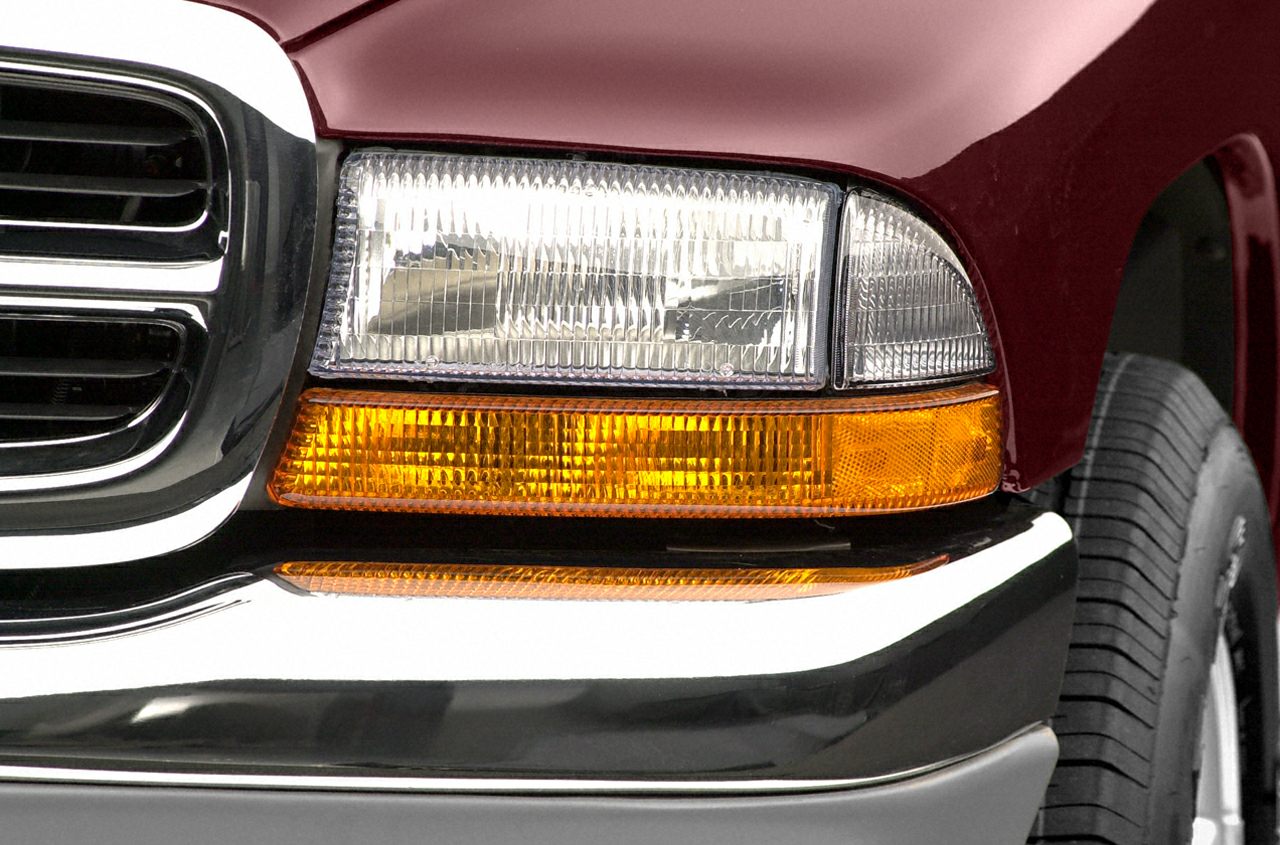 Front headlight and amber turn signal close-up