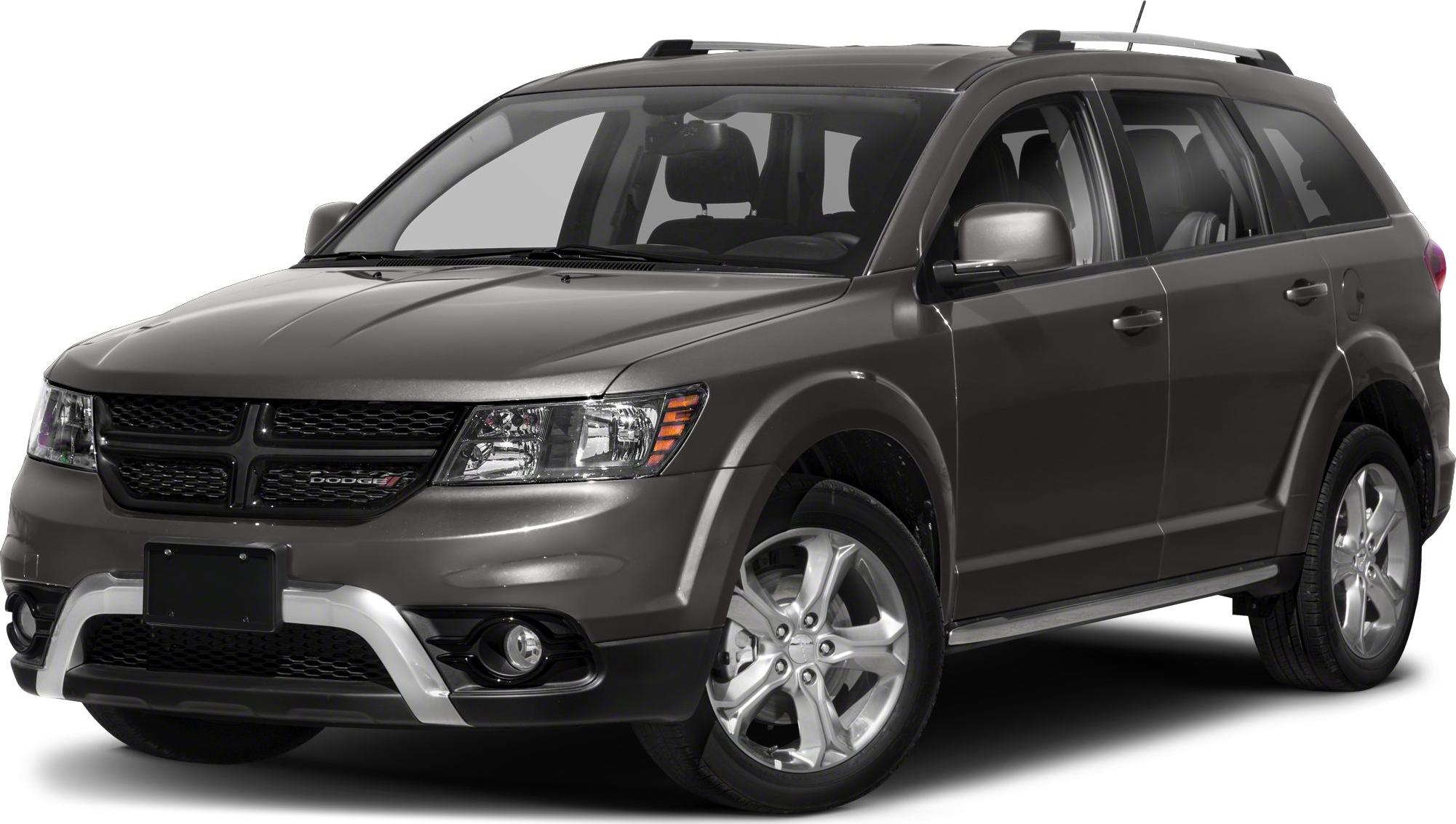 Front-side angle of a mid-size SUV with alloy wheels and roof rails