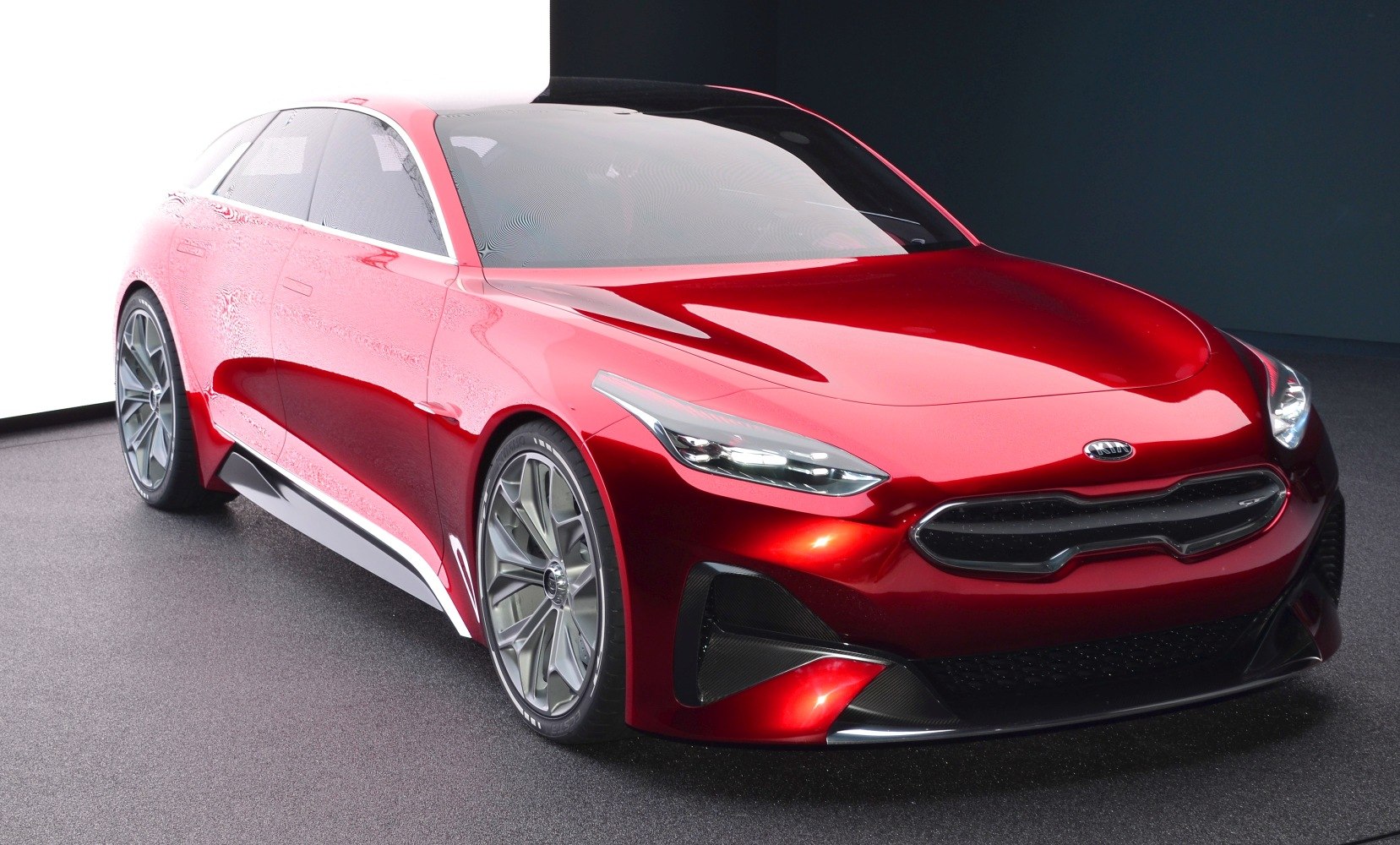 Sleek front and side view with aerodynamic design and sporty alloy wheels.