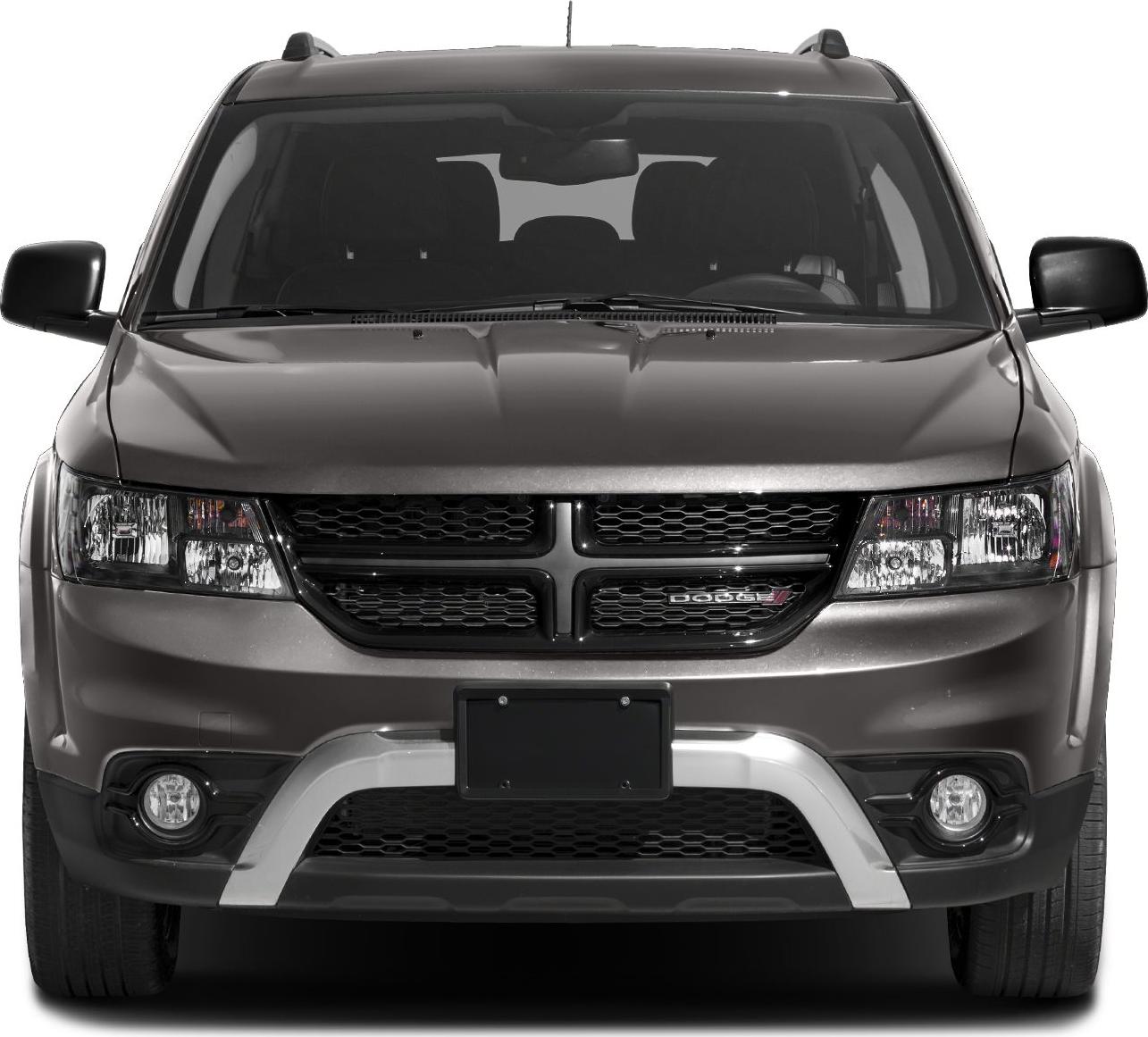 Front view showing grille, headlights, fog lights, and hood design