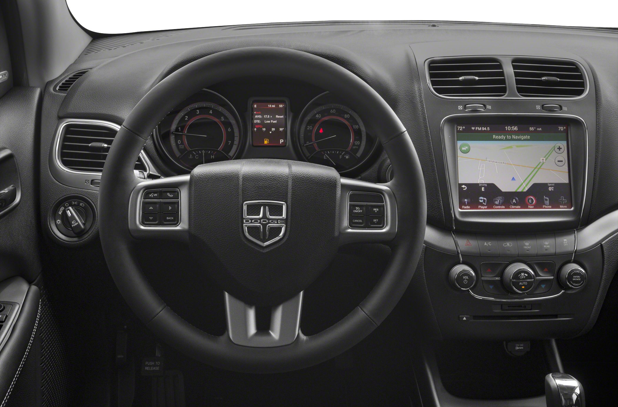 Steering wheel and touchscreen navigation system in dashboard