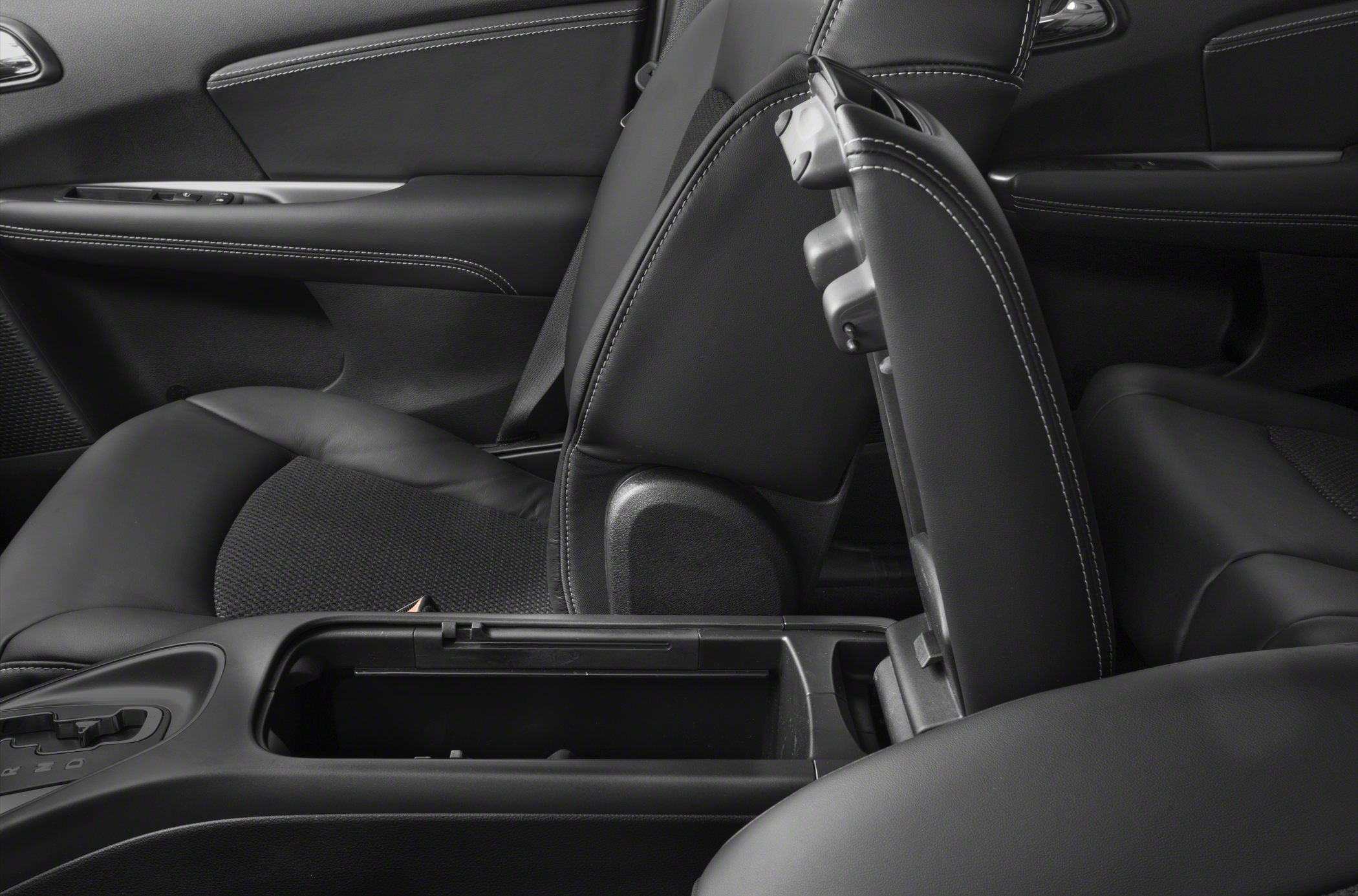 Black leather seats with open center console storage