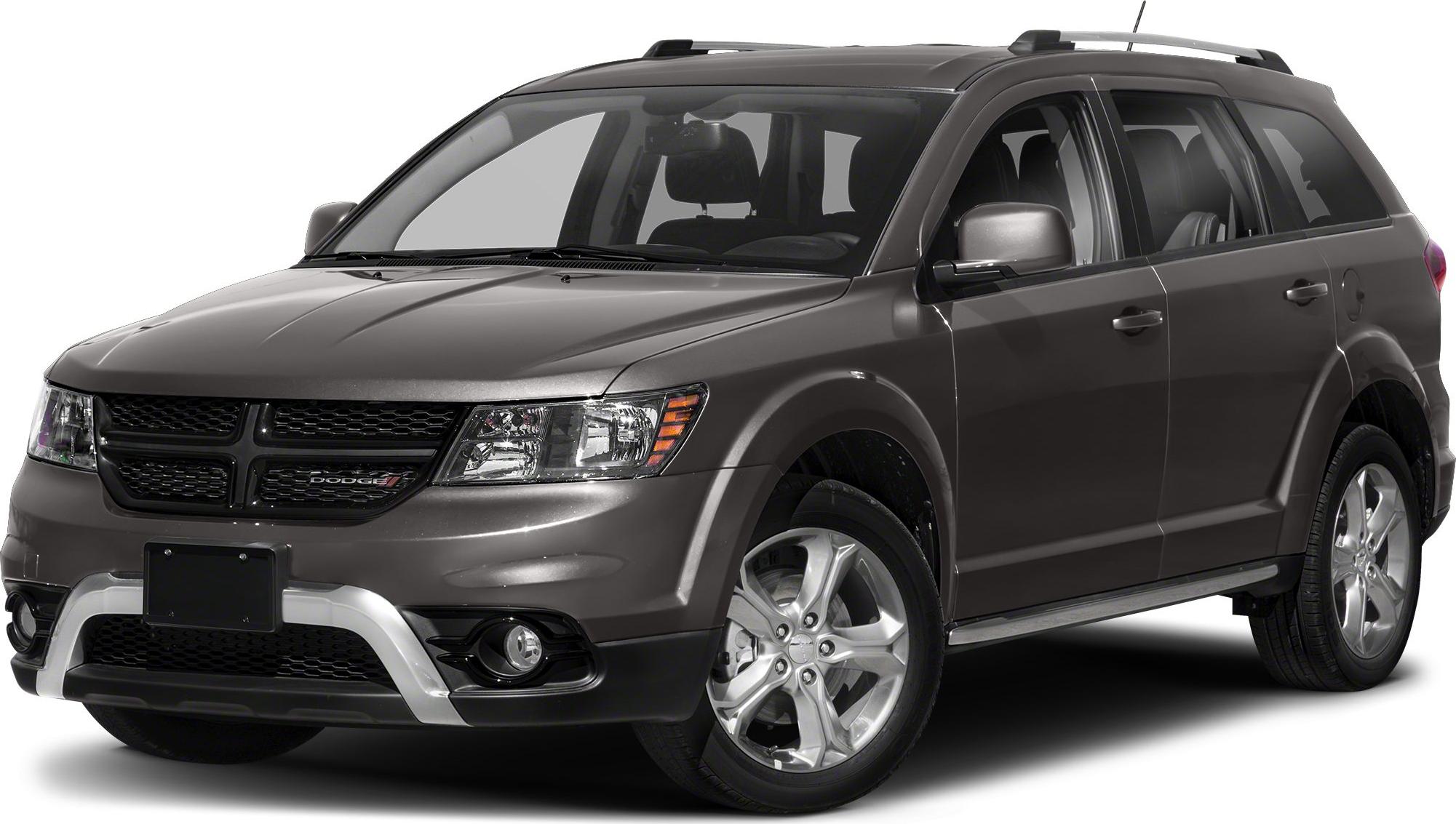 Front-side view of SUV with grille, fog lights, and alloy wheels