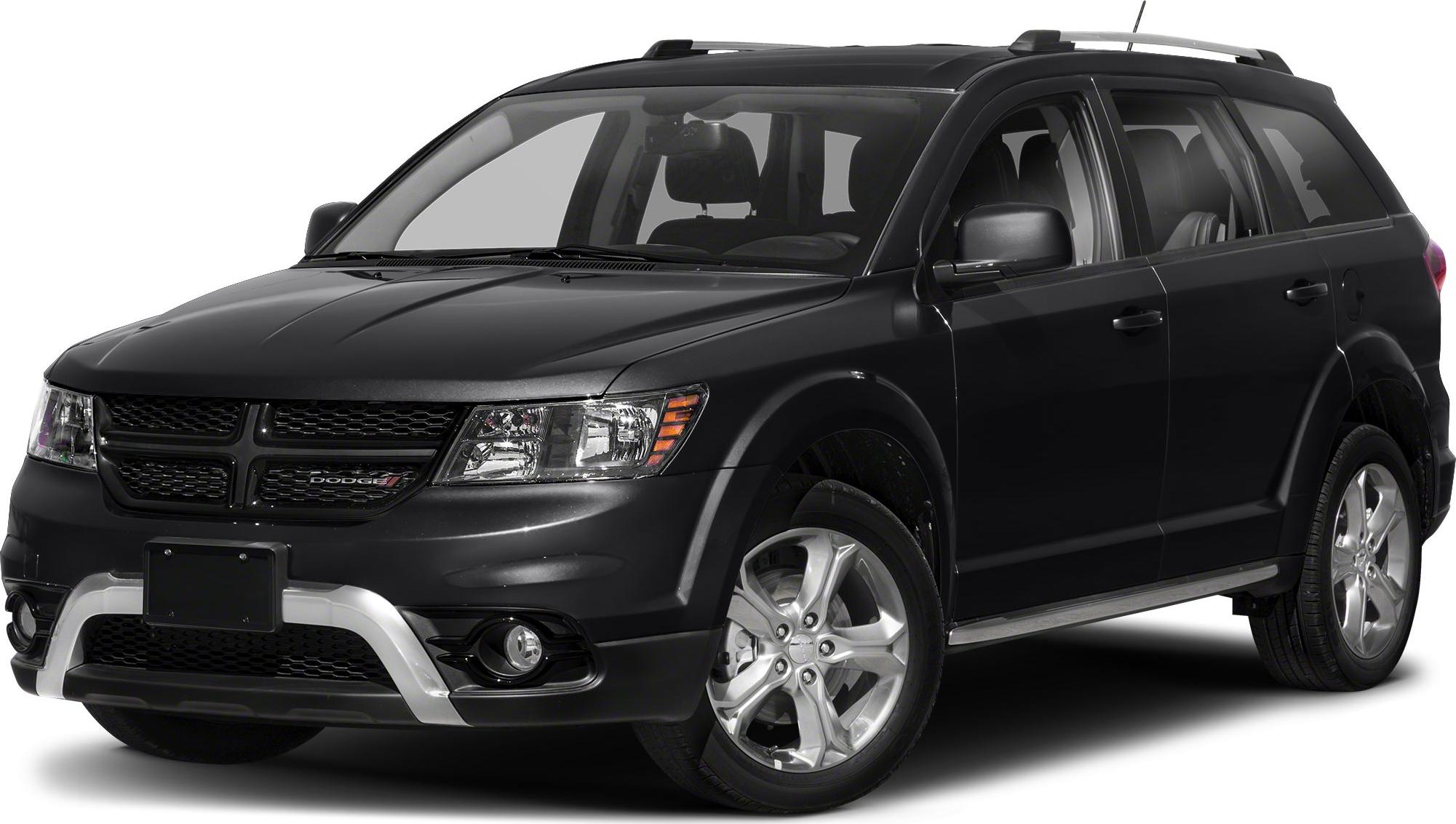 Front and side view of SUV with grille, headlights, roof rails, and alloy wheels