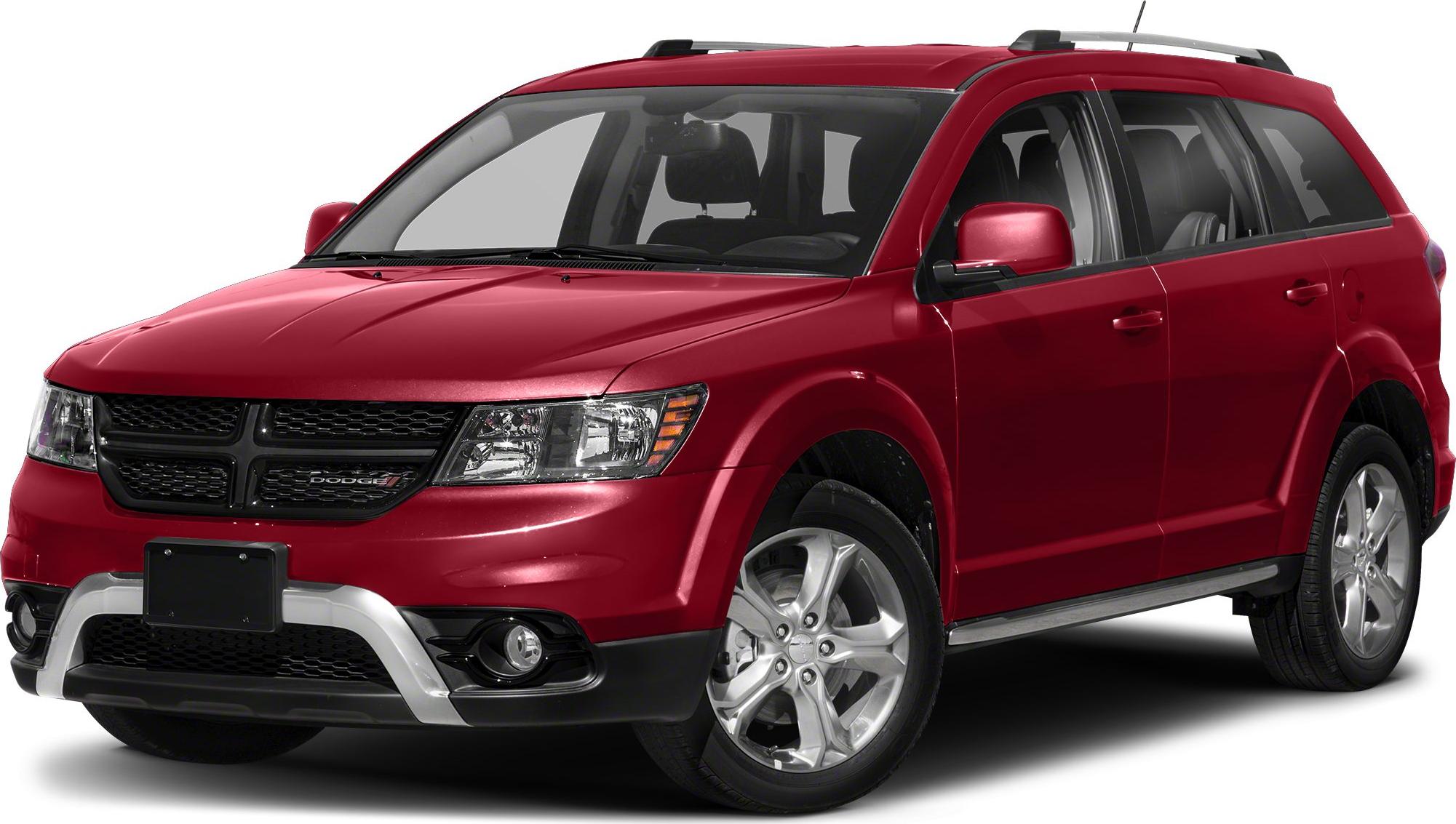 Red SUV front side view with grille, headlights, and roof rails
