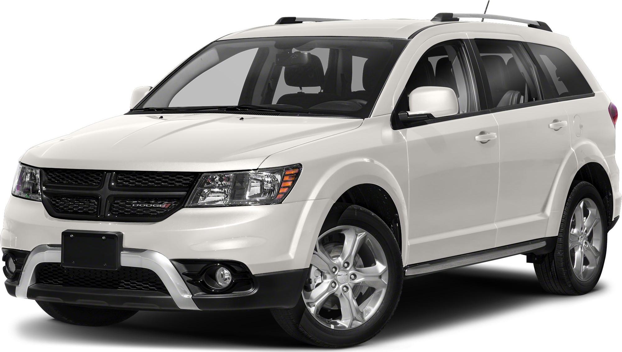 Front angle view with bold grille and alloy wheels