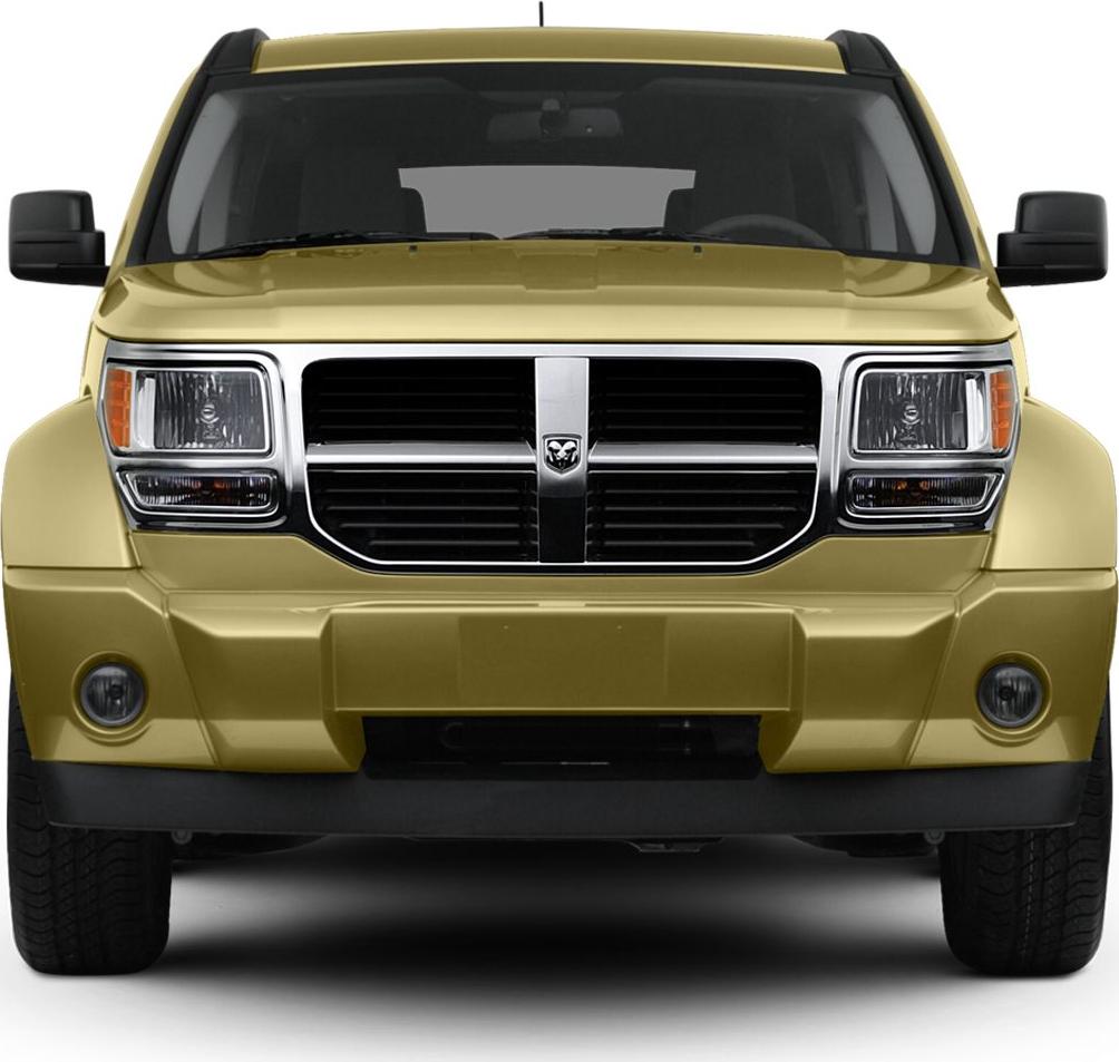 Front view with prominent grille, headlights, and rugged bumper design