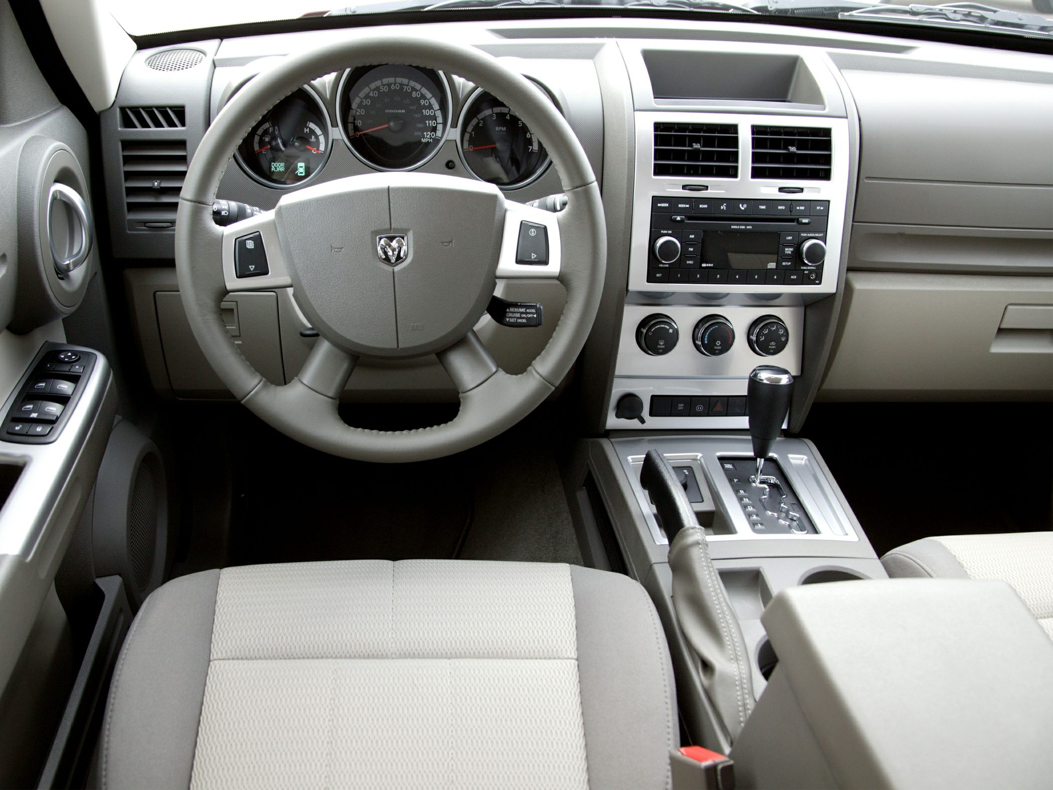 Dashboard, steering wheel, center console with gear shifter